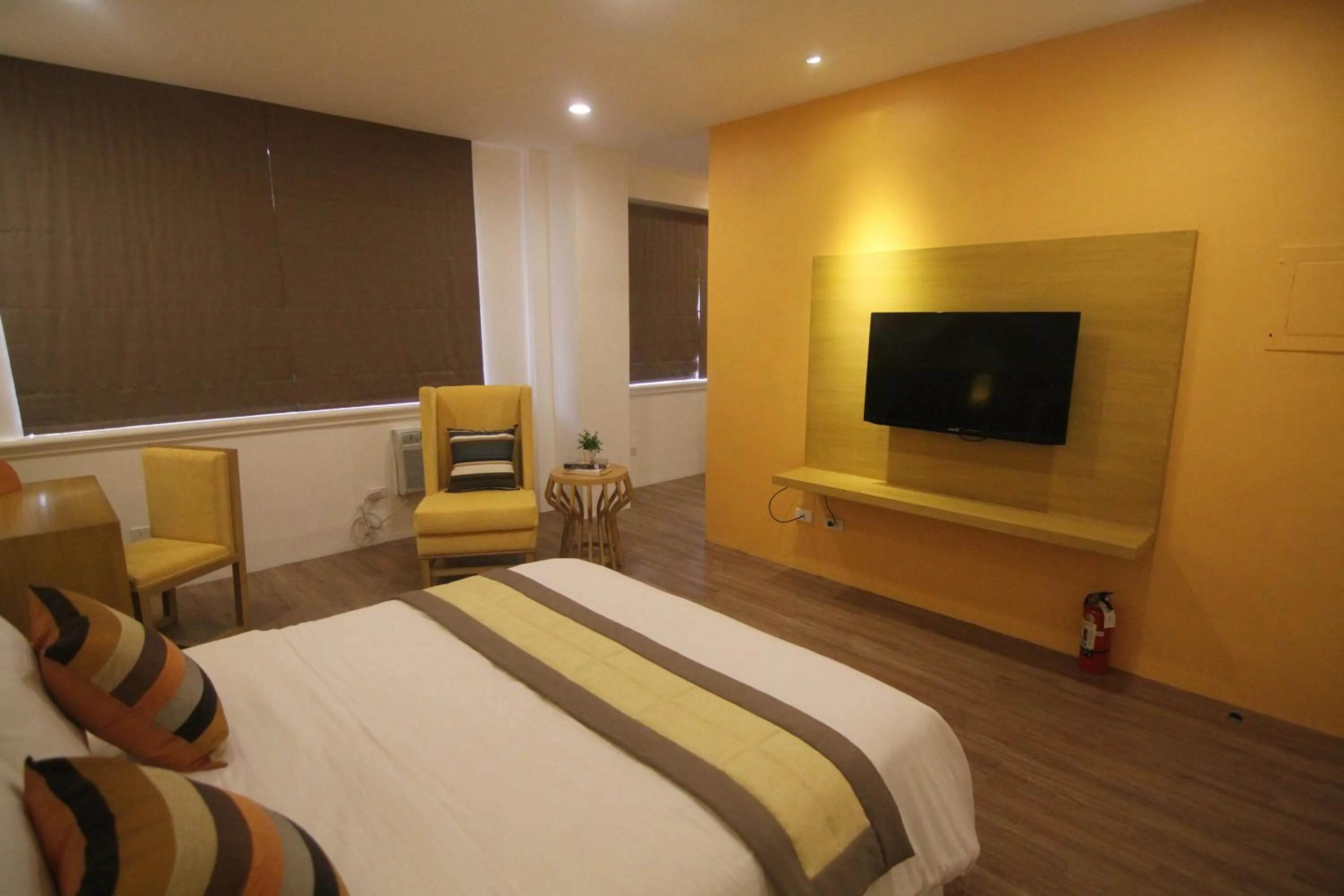 Bed in Bryan Condo Suites Makati near Airport