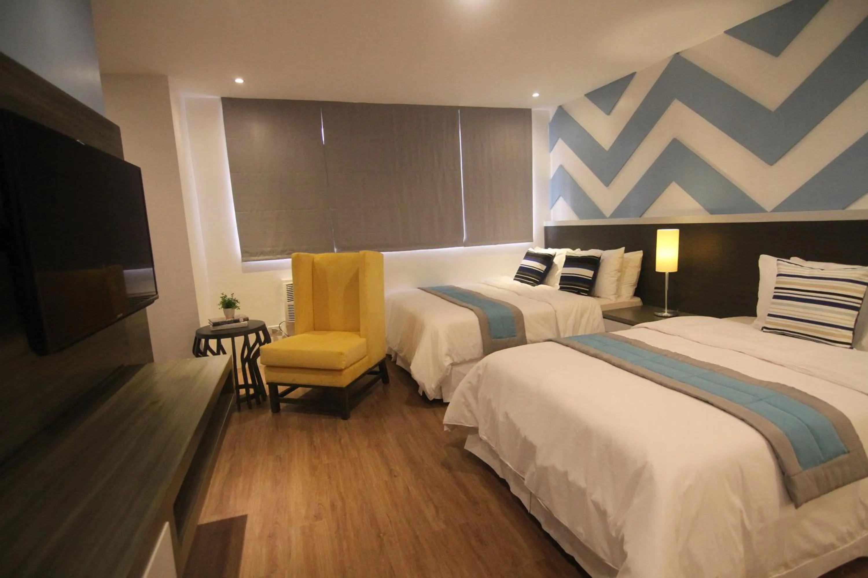 Bed in Bryan Condo Suites Makati near Airport