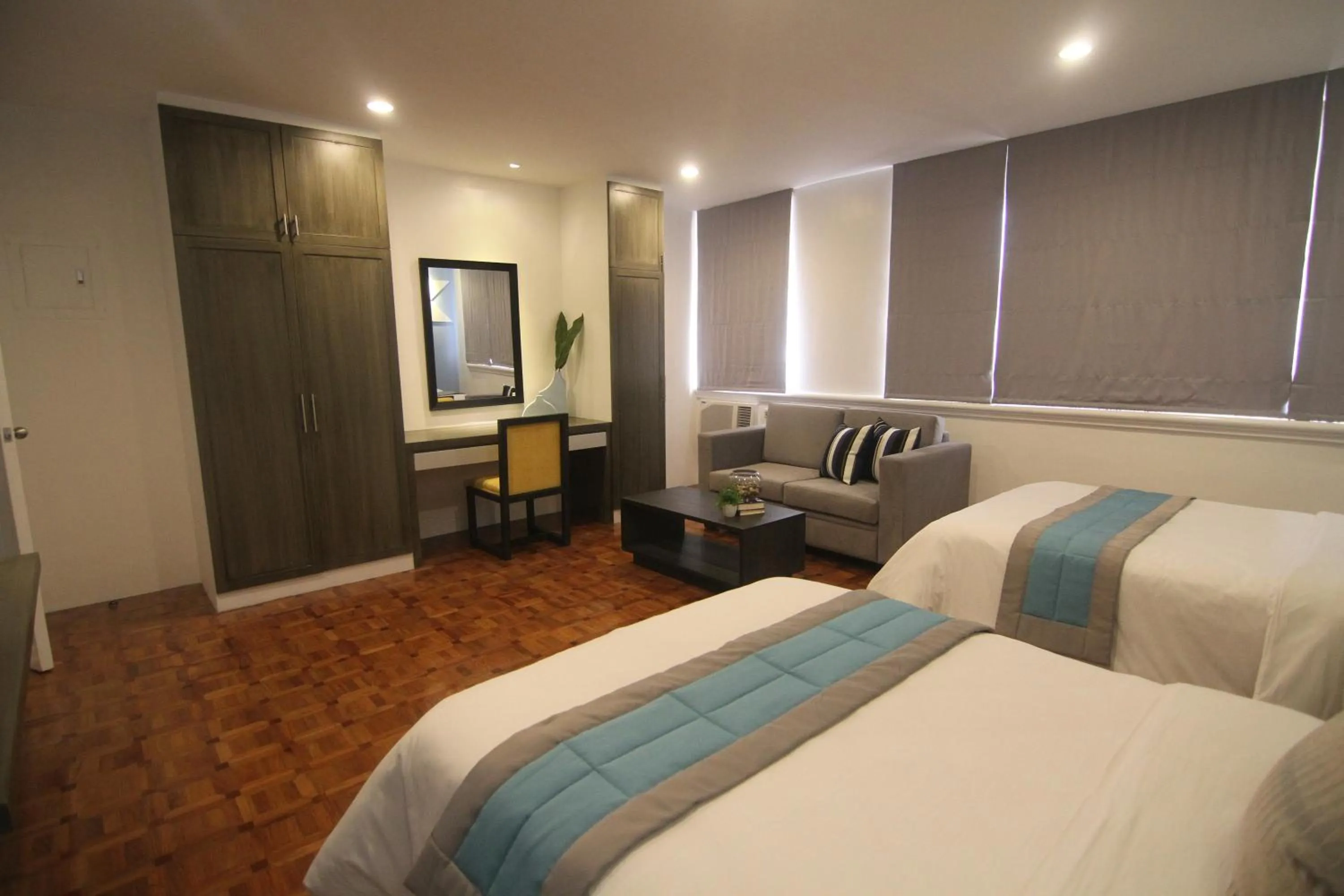 Bed in Bryan Condo Suites Makati near Airport