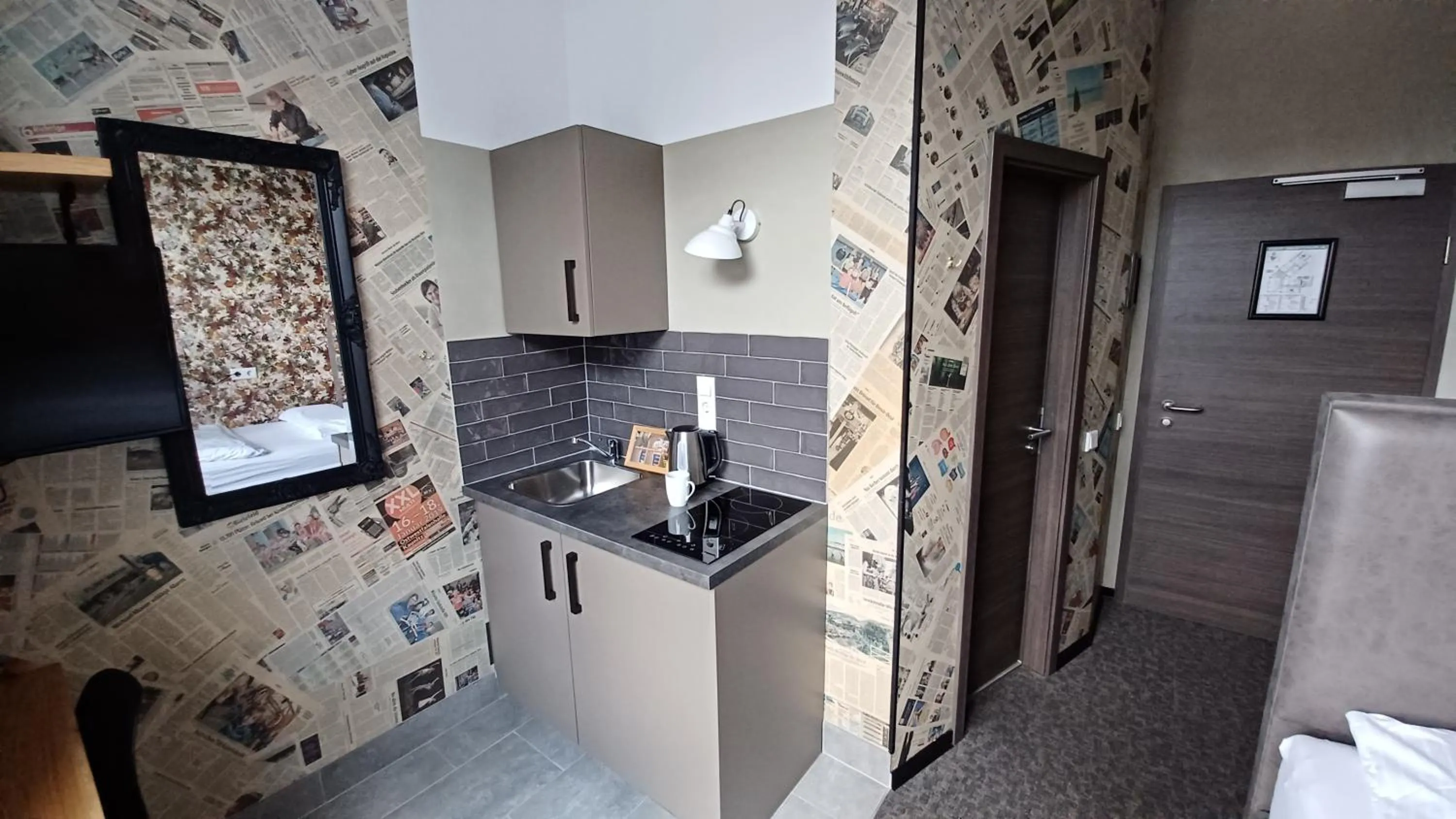 Kitchen or kitchenette in aappartel APARTHOTEL Herford