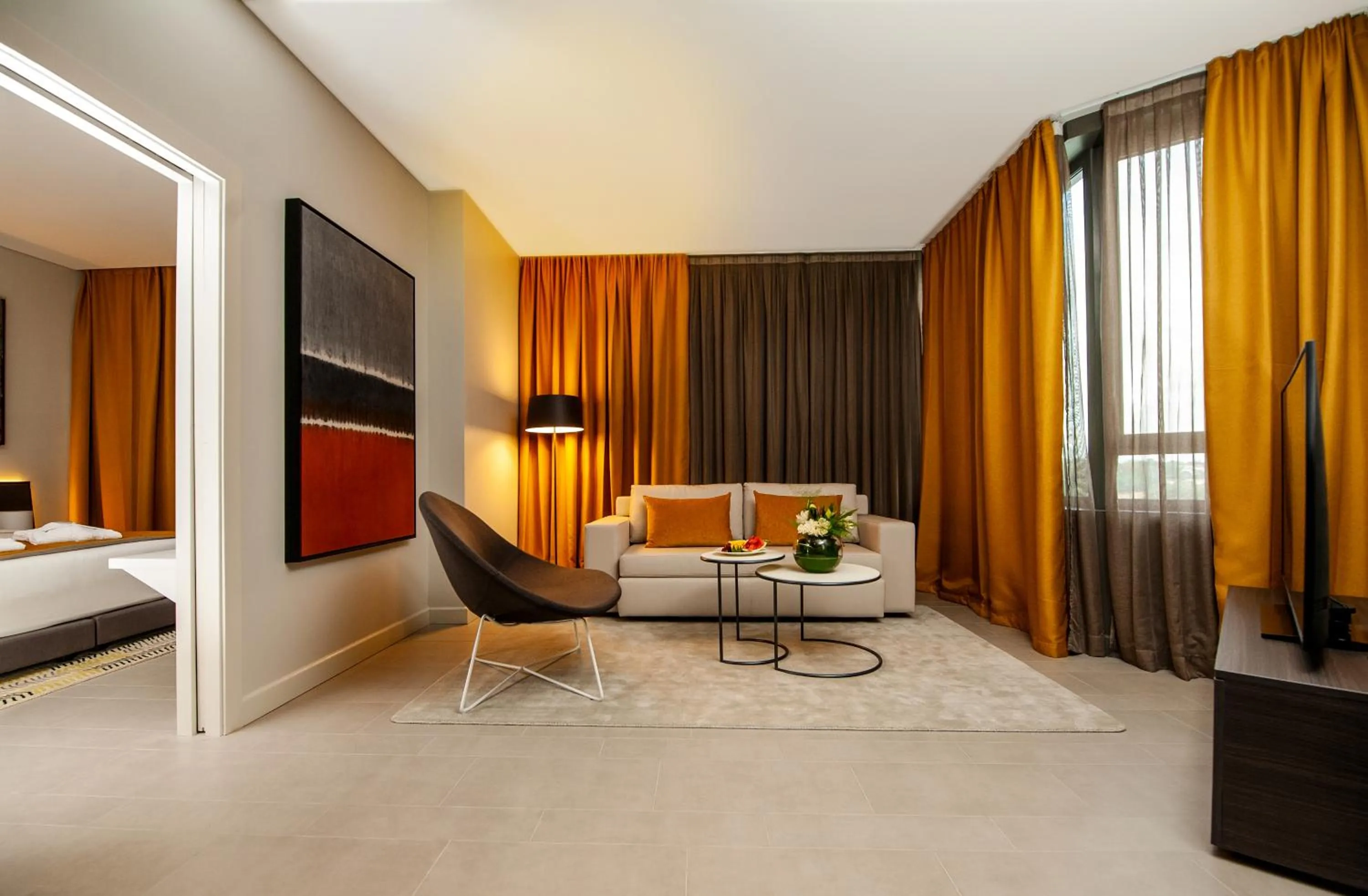 Living room, Bed in Noom Hotel Abidjan Plateau