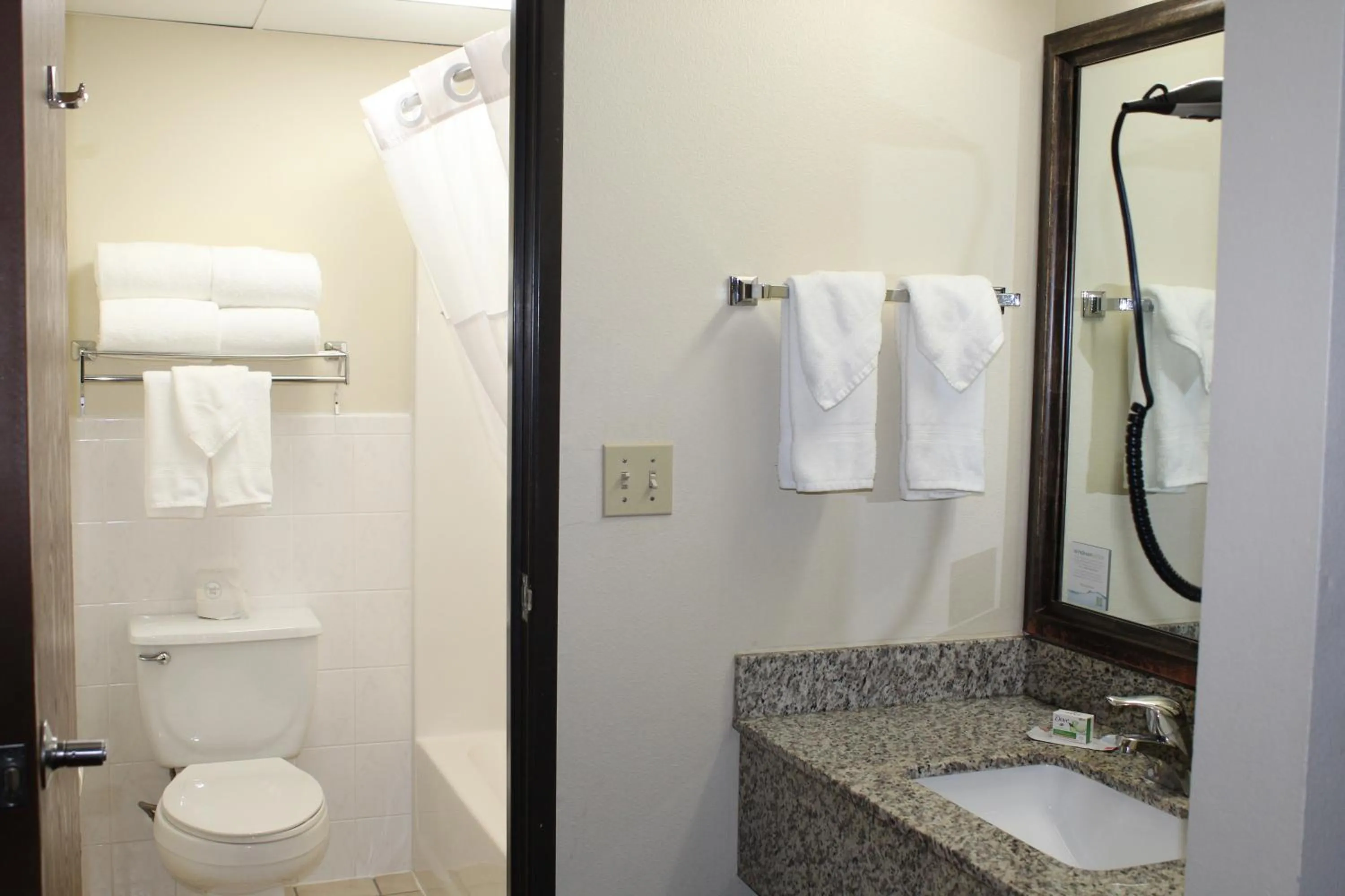 Bathroom in AmericInn by Wyndham Windsor Ft. Collins