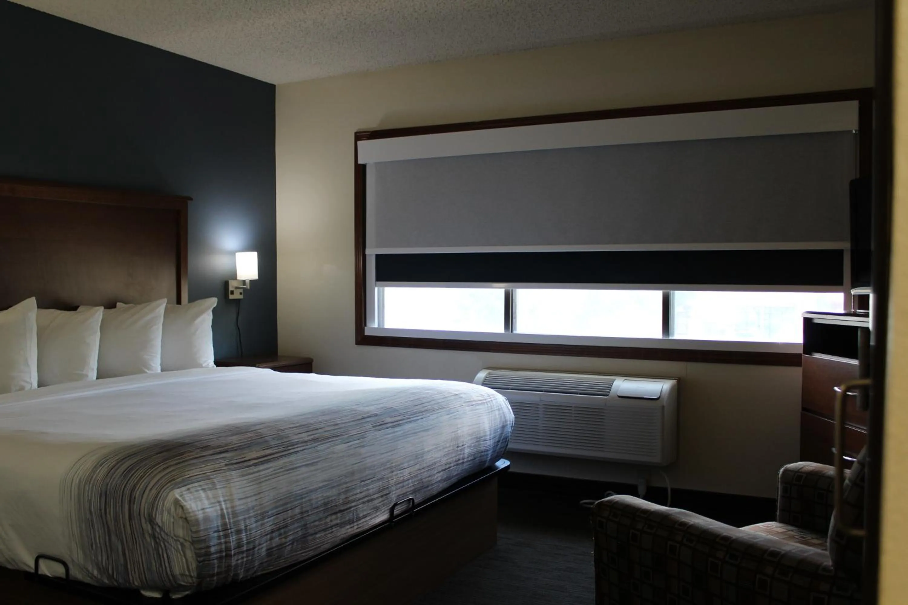 Bedroom, Bed in AmericInn by Wyndham Windsor Ft. Collins