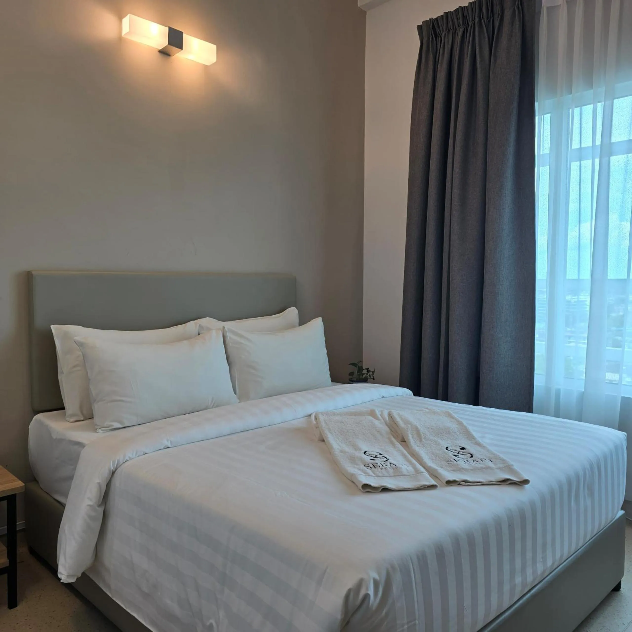 Bed in Serapi Verdure Hotel