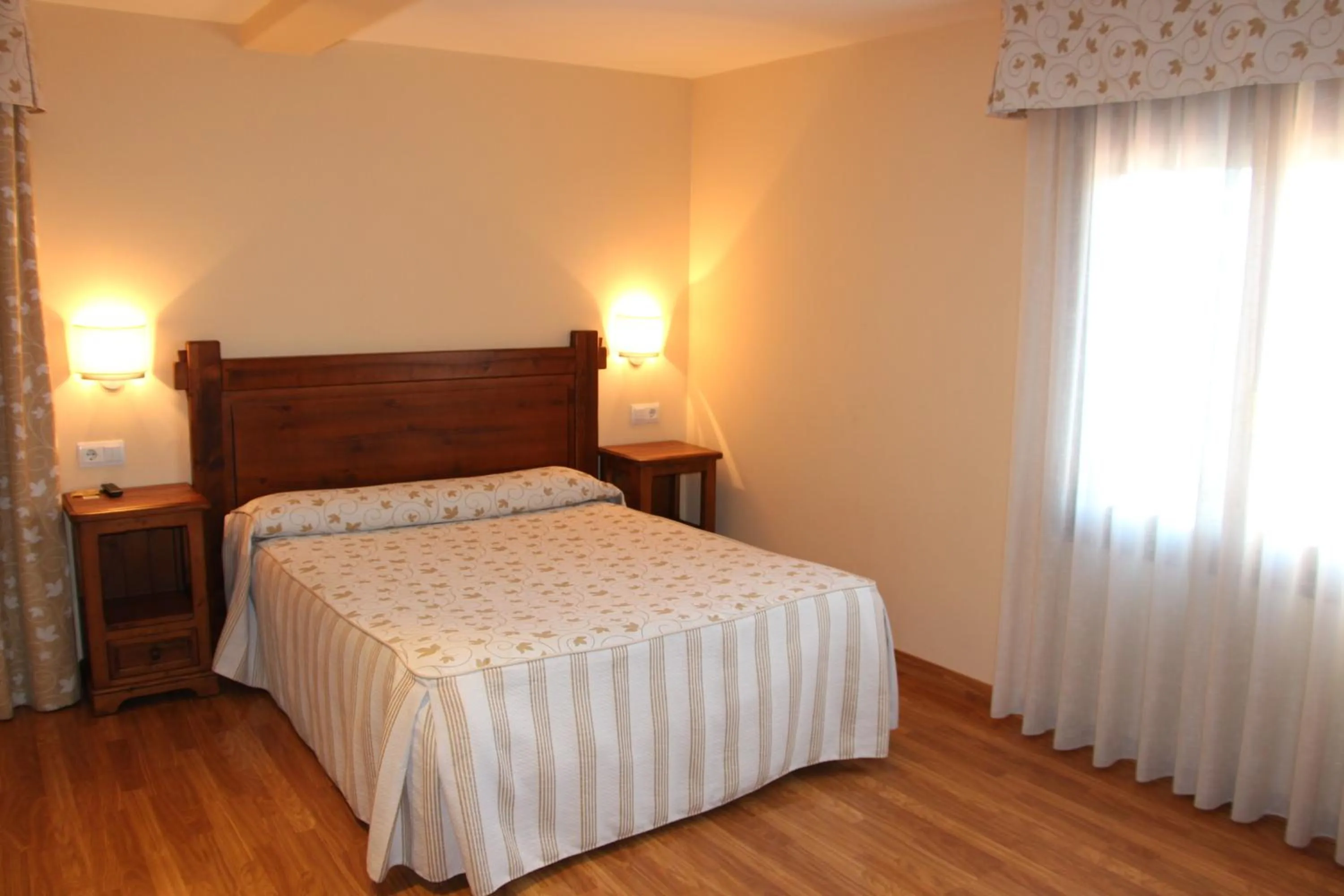 Bed in Aparthotel Tres Caminos