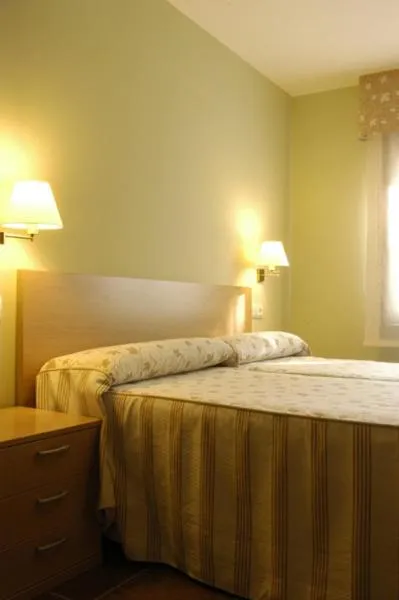 Bed in Aparthotel Tres Caminos