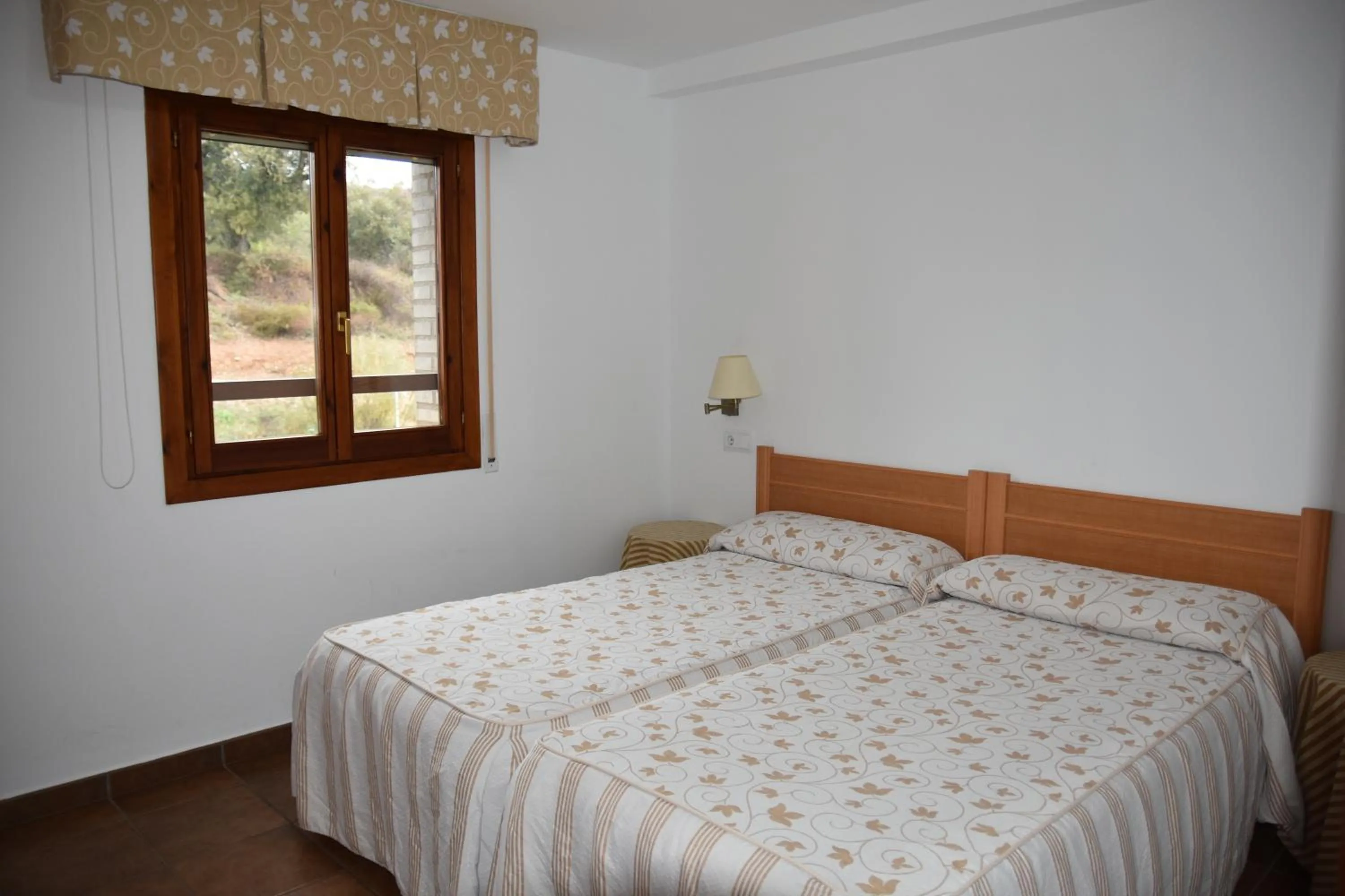 Bed in Aparthotel Tres Caminos