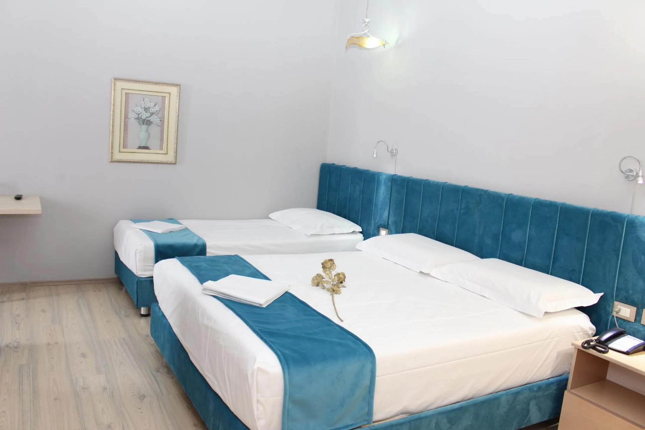 Bed in Theranda Boutique Hotel