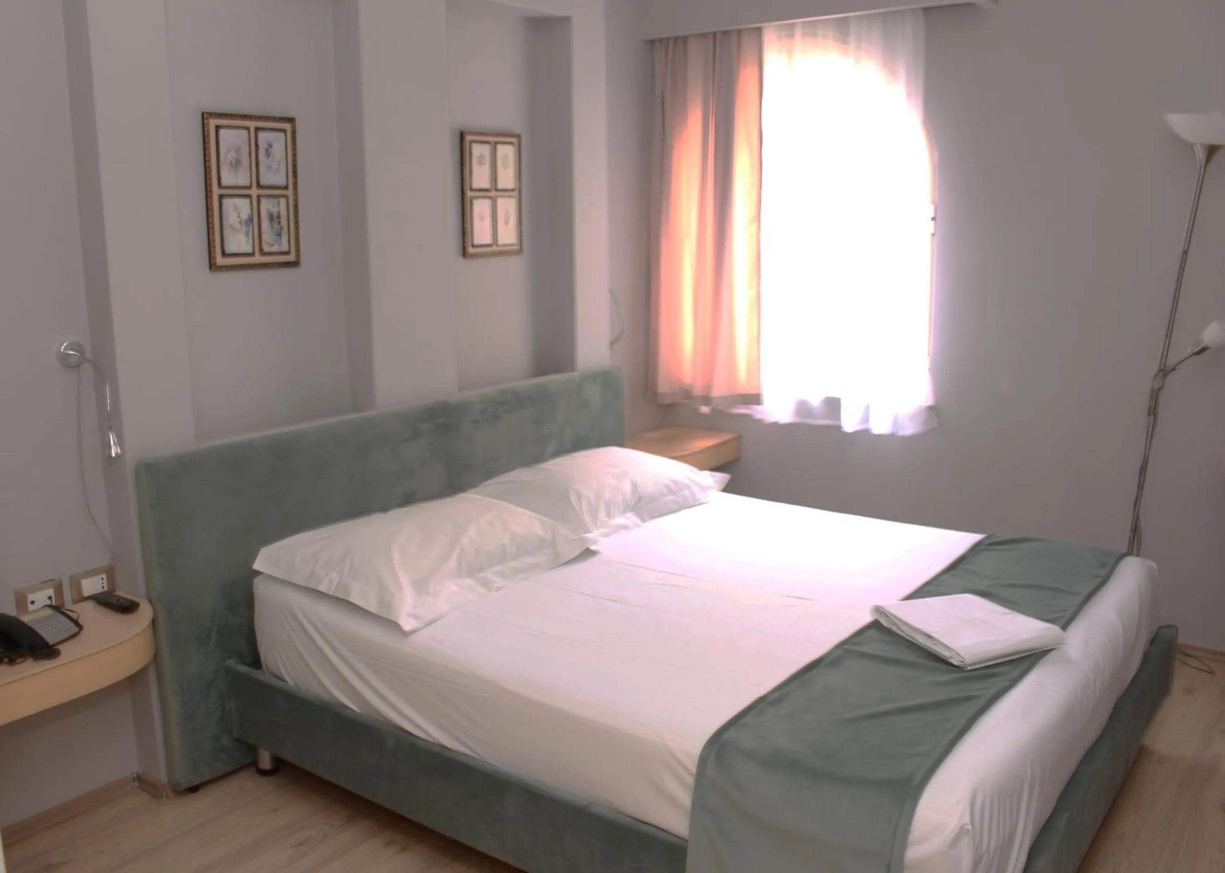 Bed in Theranda Boutique Hotel