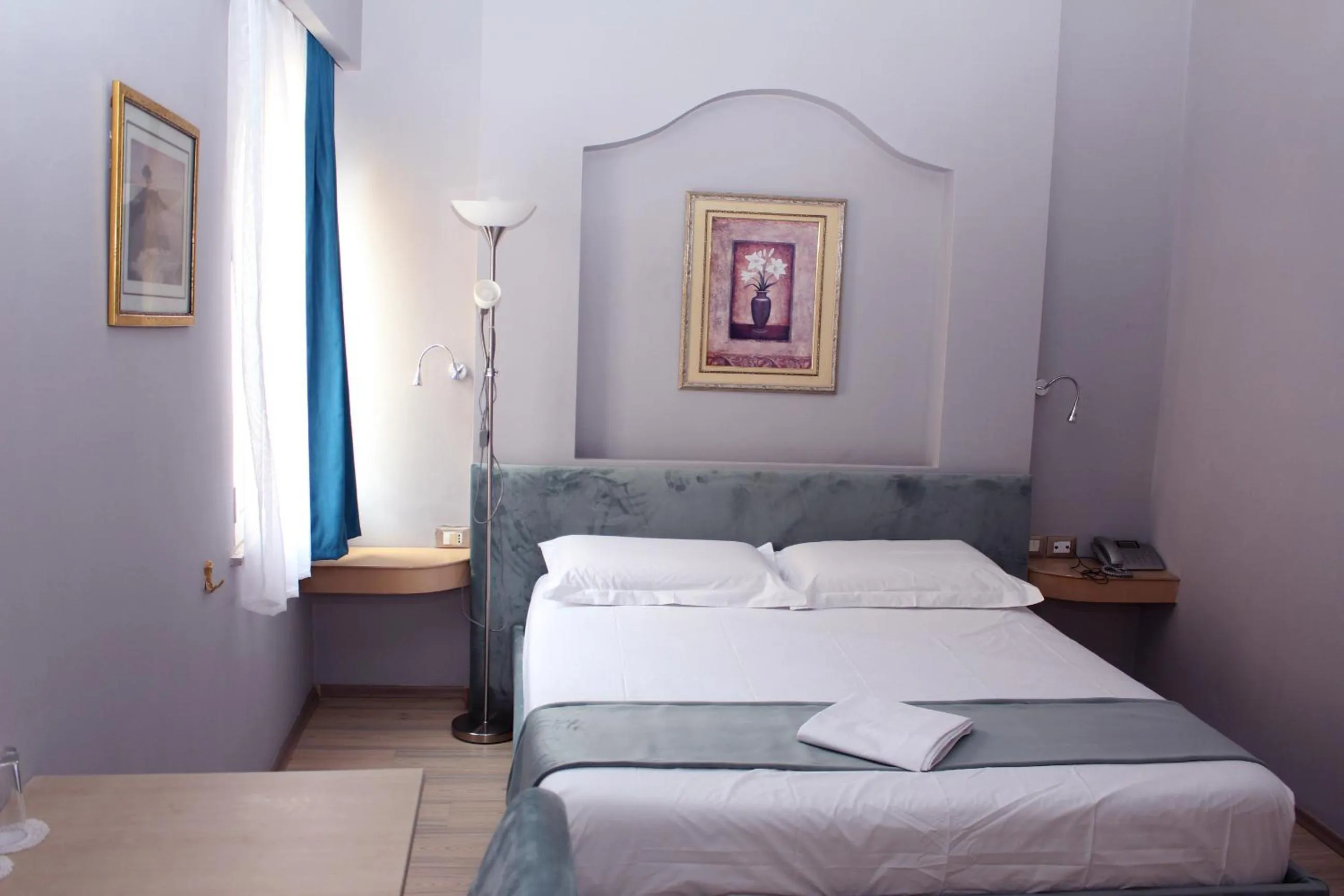 Bed in Theranda Boutique Hotel
