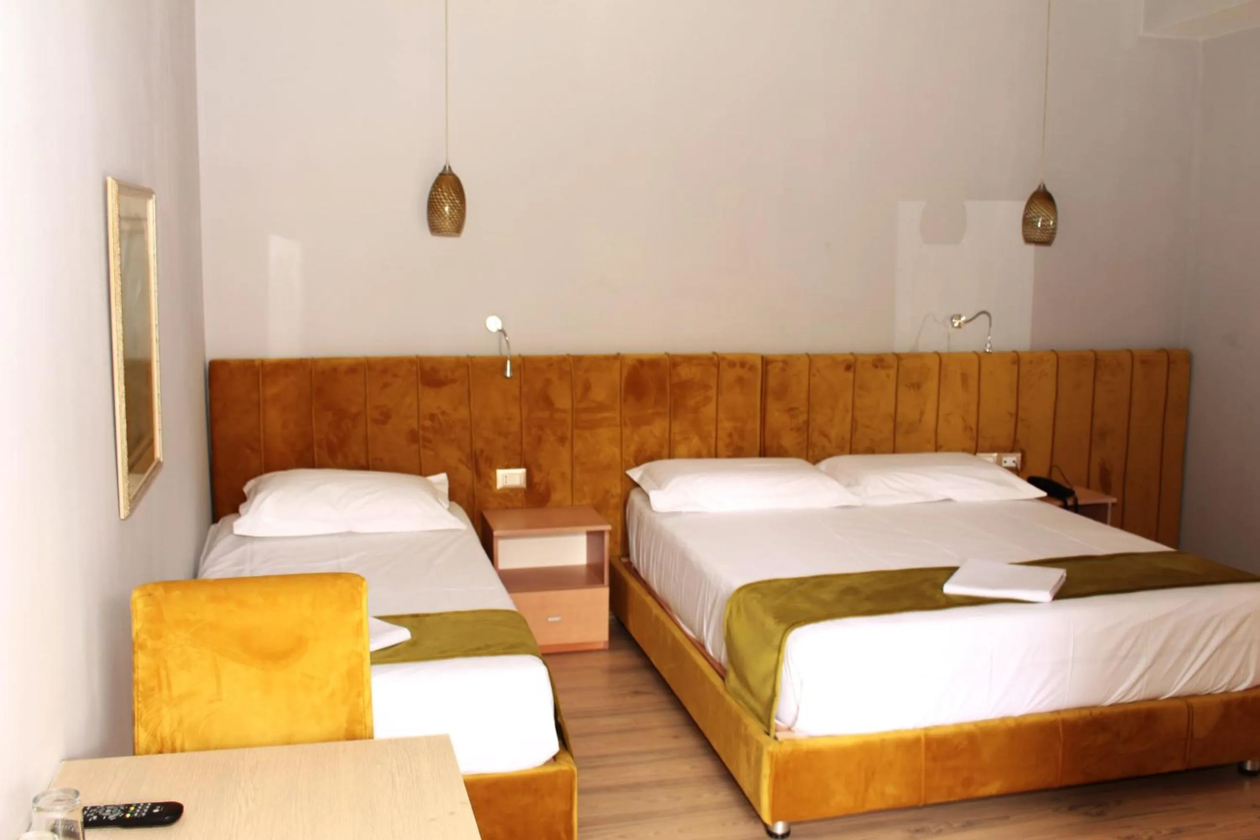 Bed in Theranda Boutique Hotel