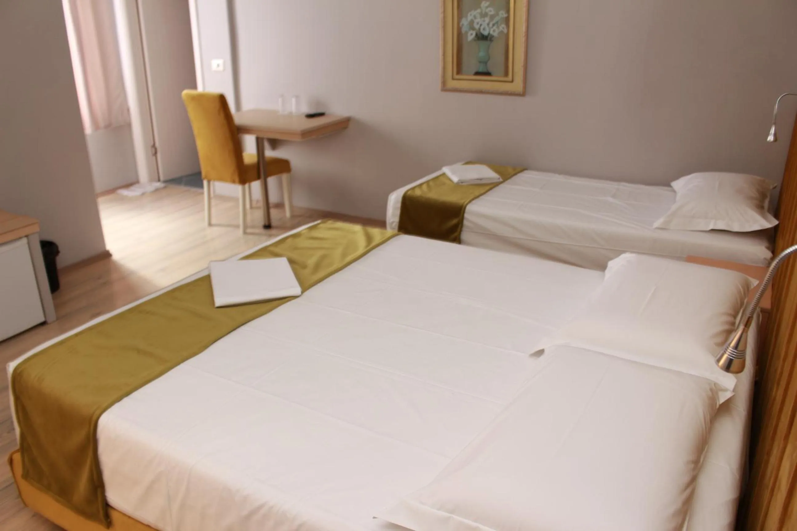 Bed in Theranda Boutique Hotel