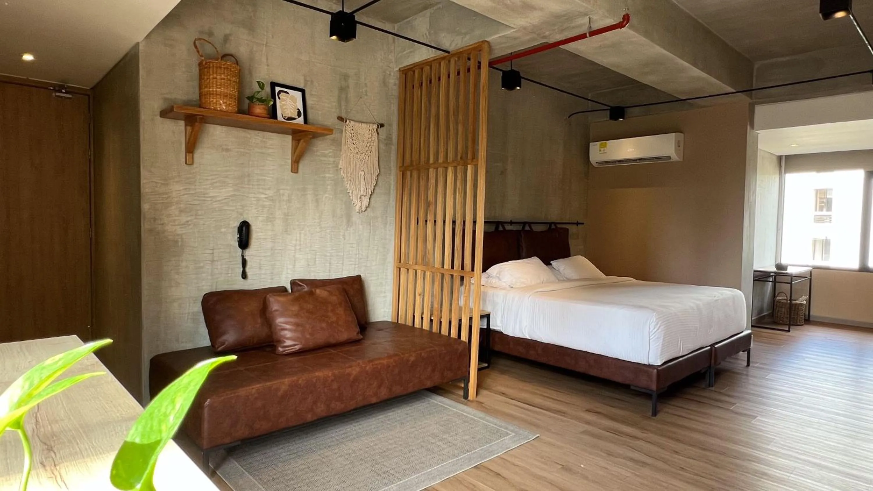 Bed in Mosaic Studios Buenavista