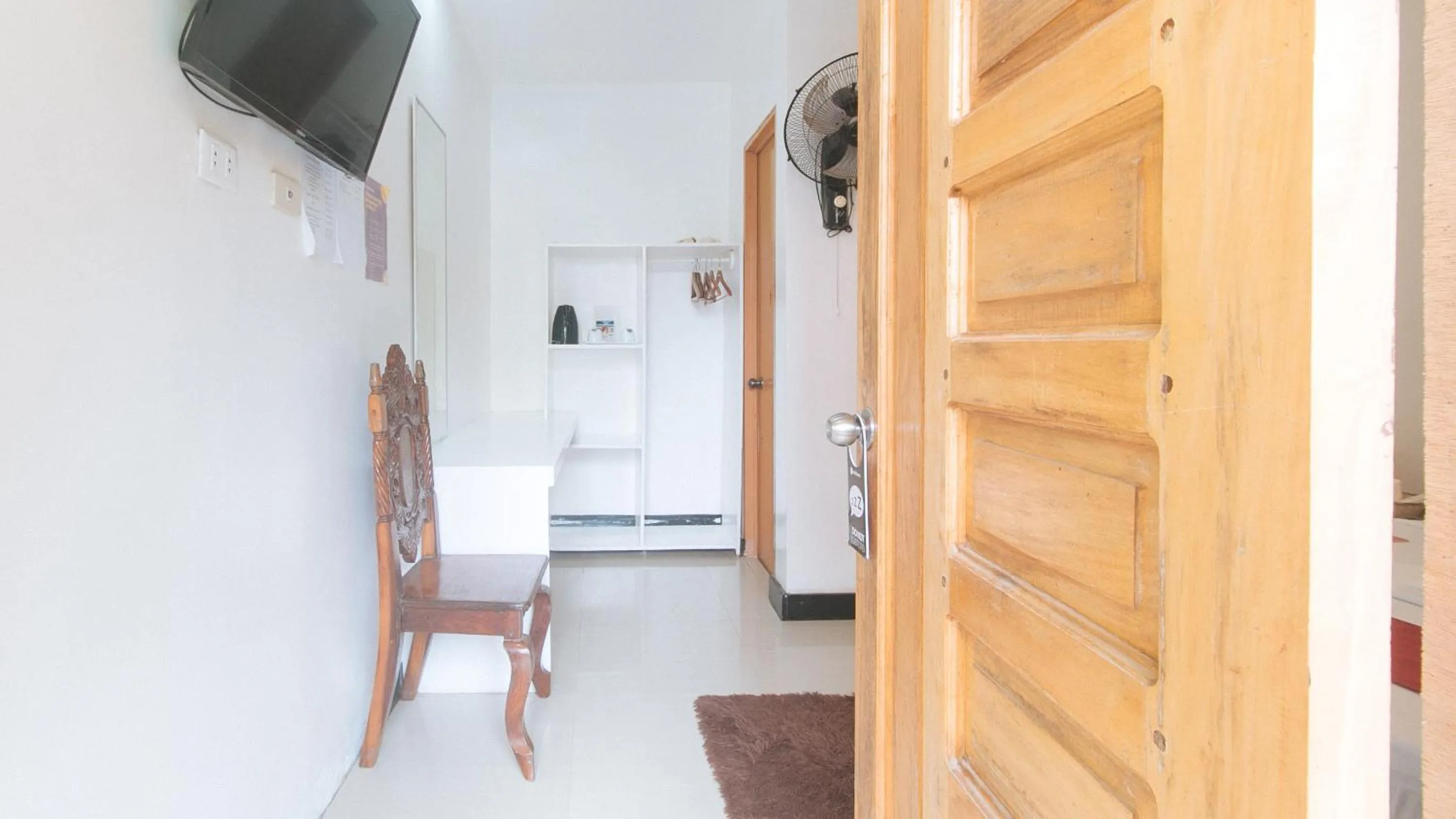 TV and multimedia in RedDoorz @ Lualhati Garden Cottage El Nido Palawan