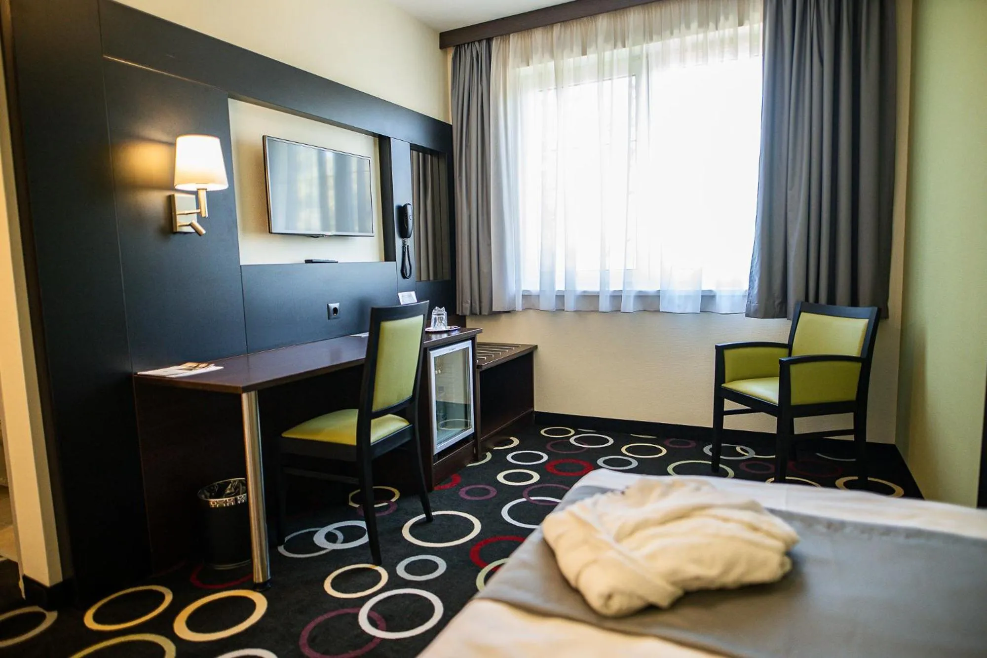 Seating area, Bed in Garden Hotel Wellness és Konferencia