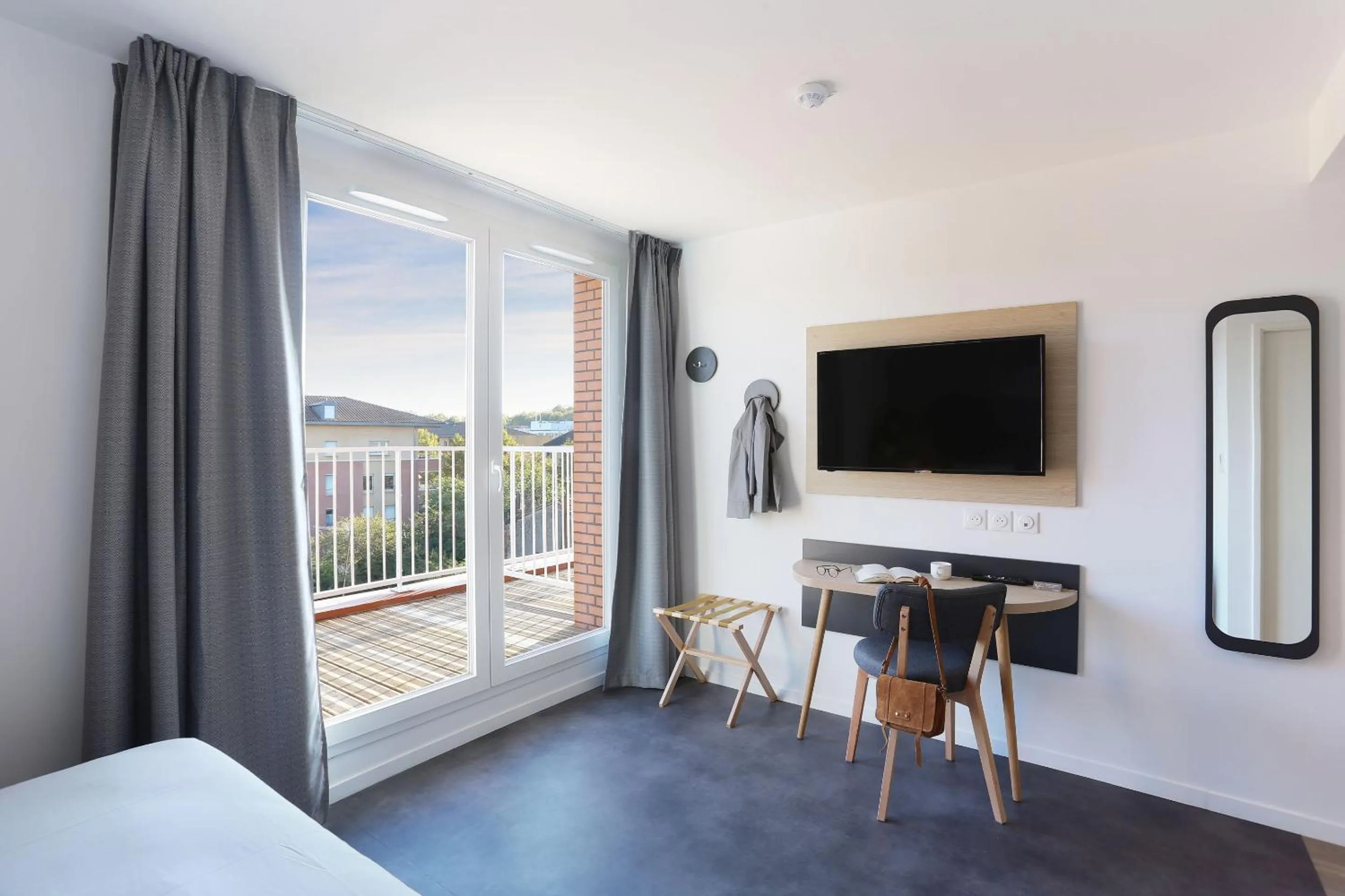 Seating area, Bed in Appart Hotel Odalys City Toulouse Centre Compans Caffarelli