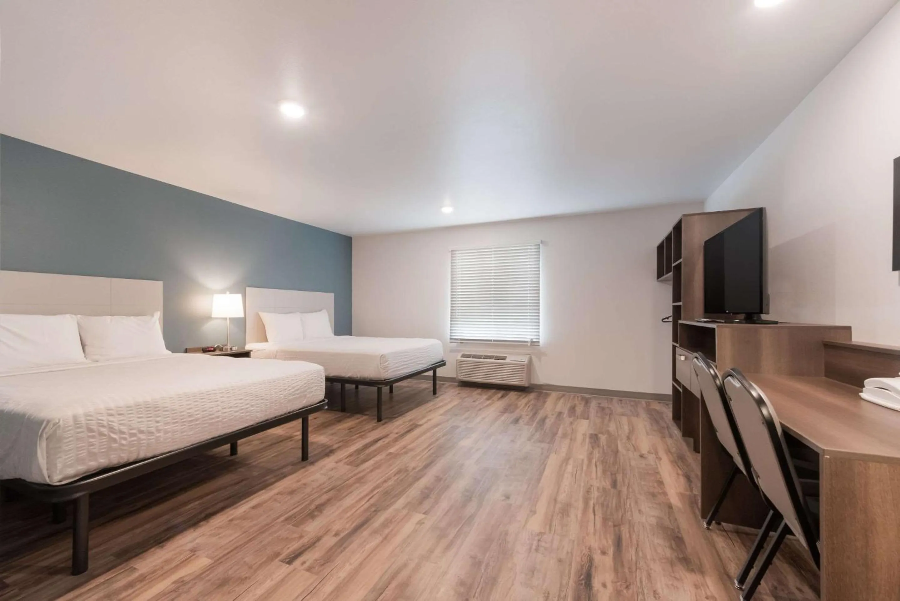 Bedroom, Bed in WoodSpring Suites Philadelphia Northeast