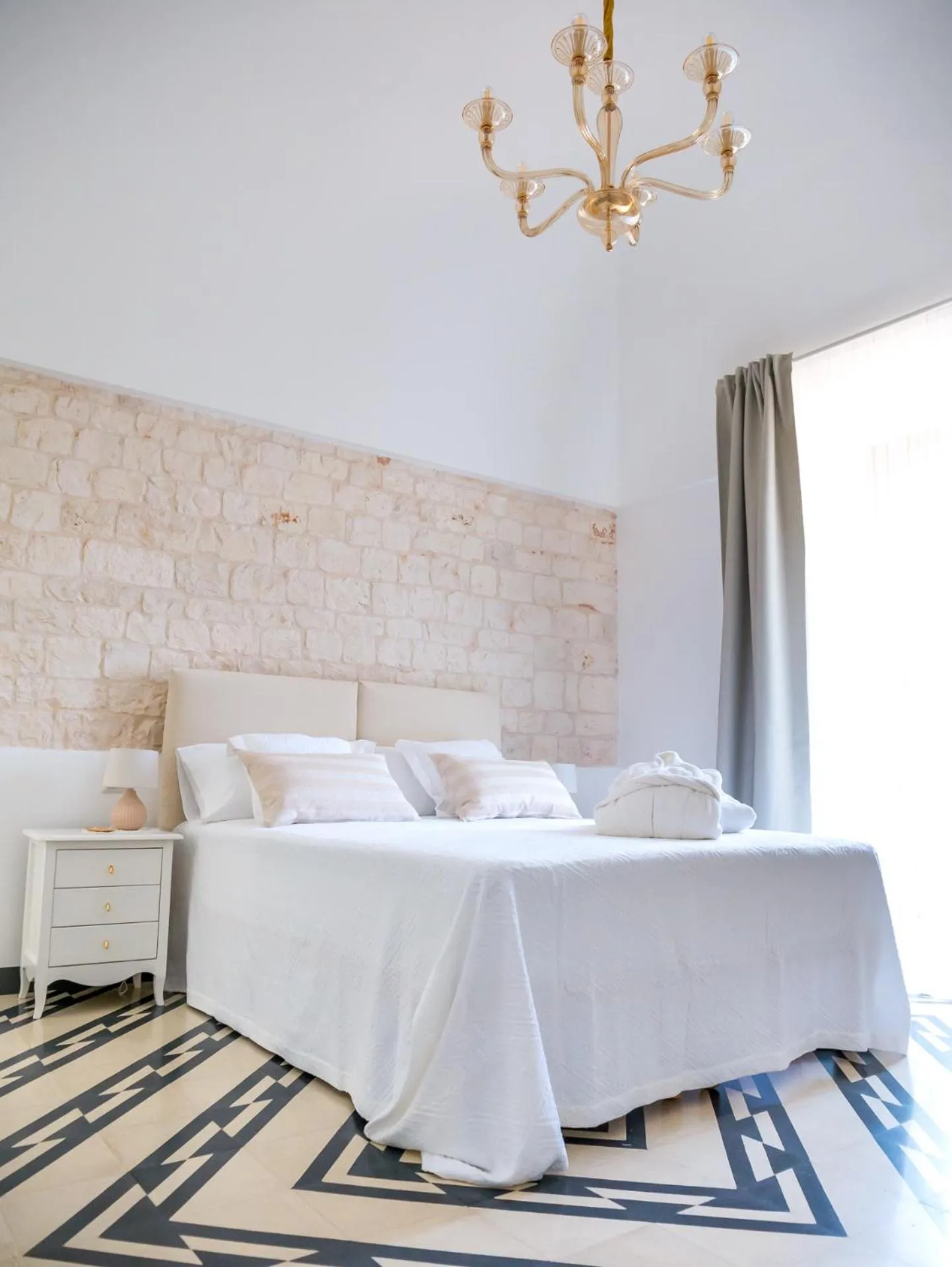 Bed in Villa Aurelia Suites and Apartments