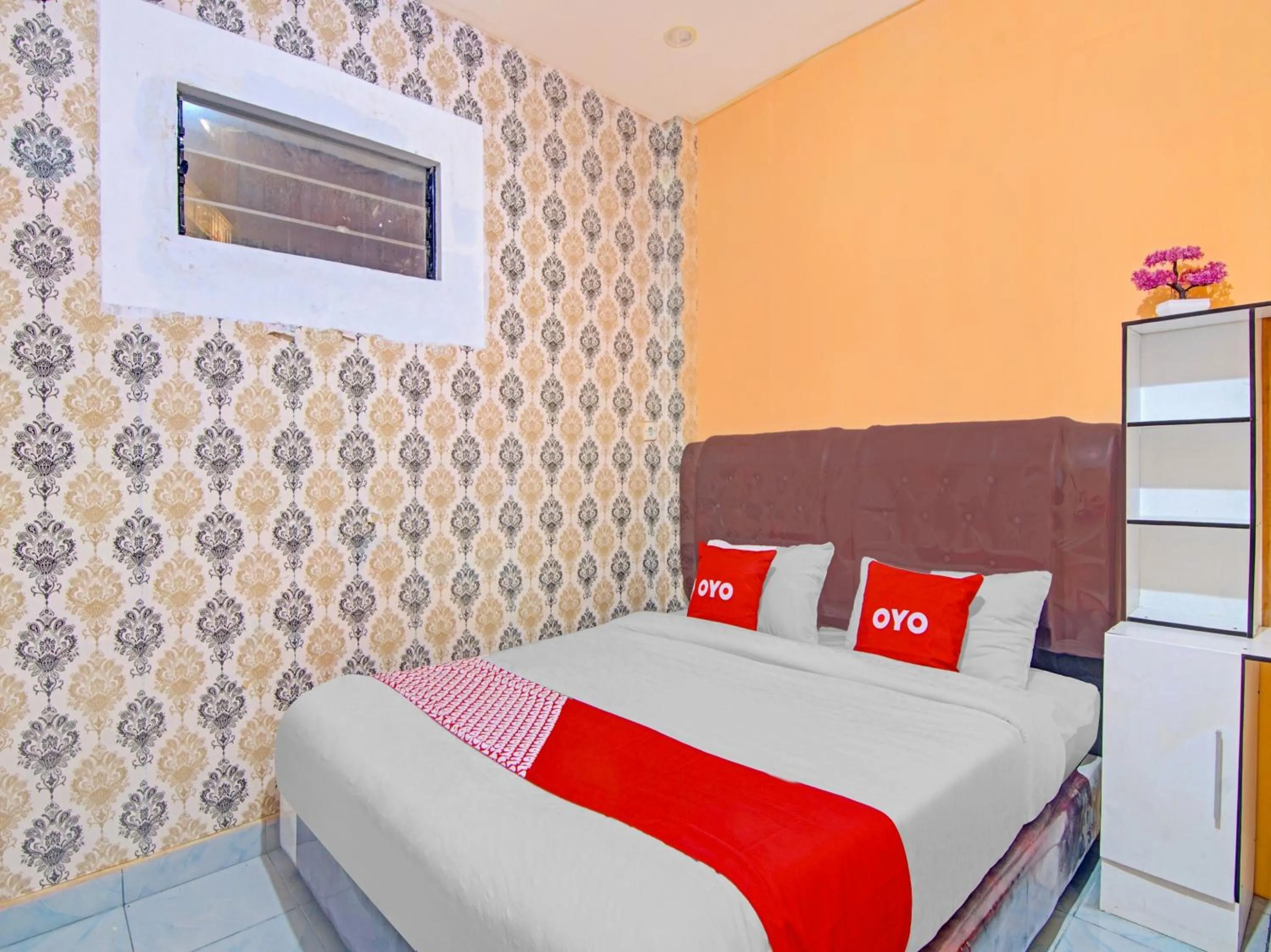 Bedroom in OYO 90615 Jojo Homestay