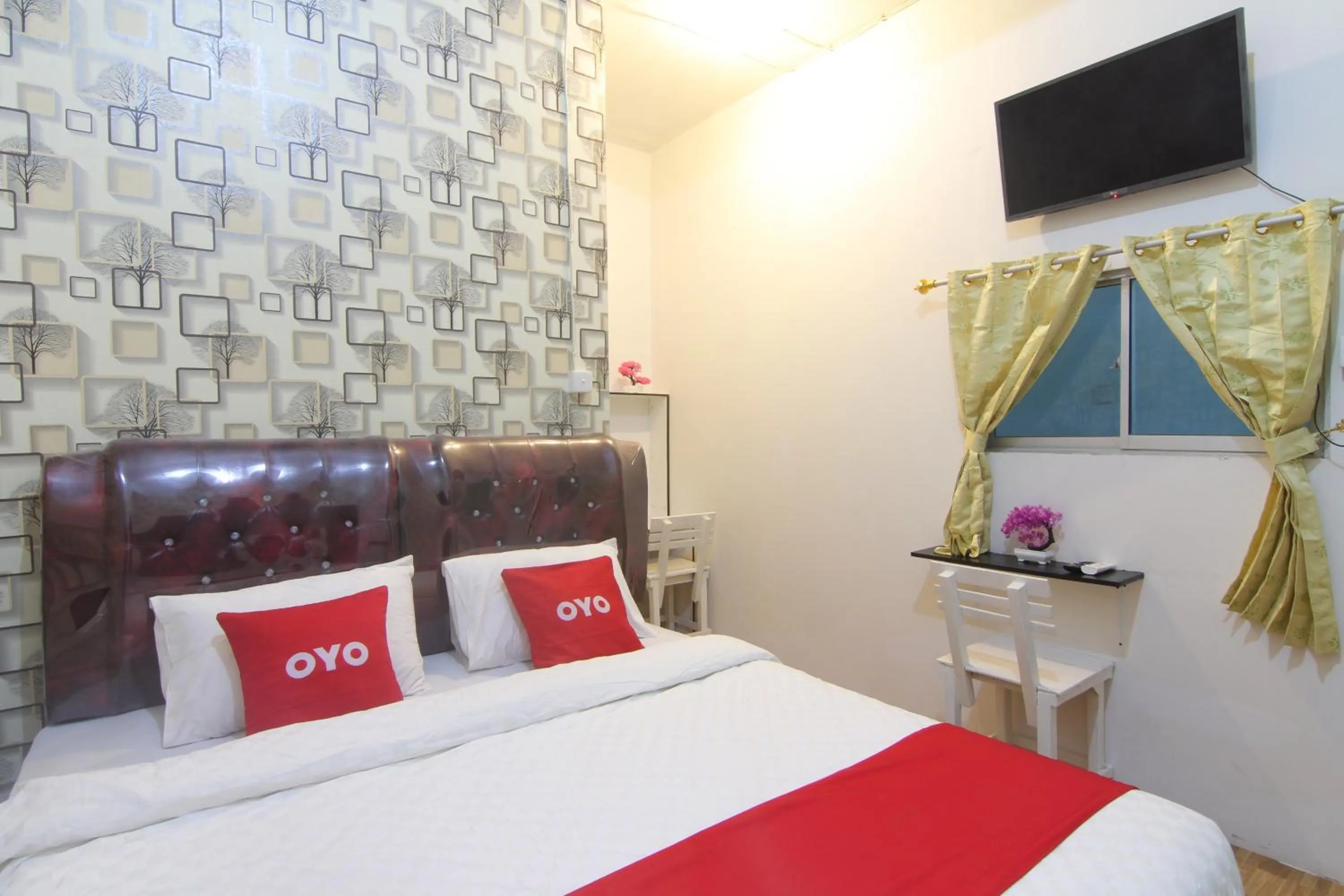 Bedroom in OYO 90615 Jojo Homestay