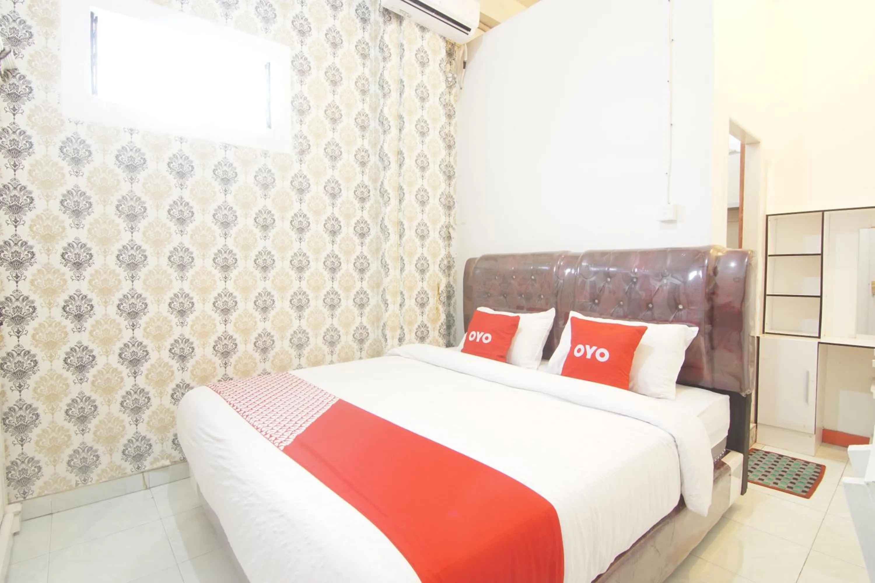 Bedroom in OYO 90615 Jojo Homestay