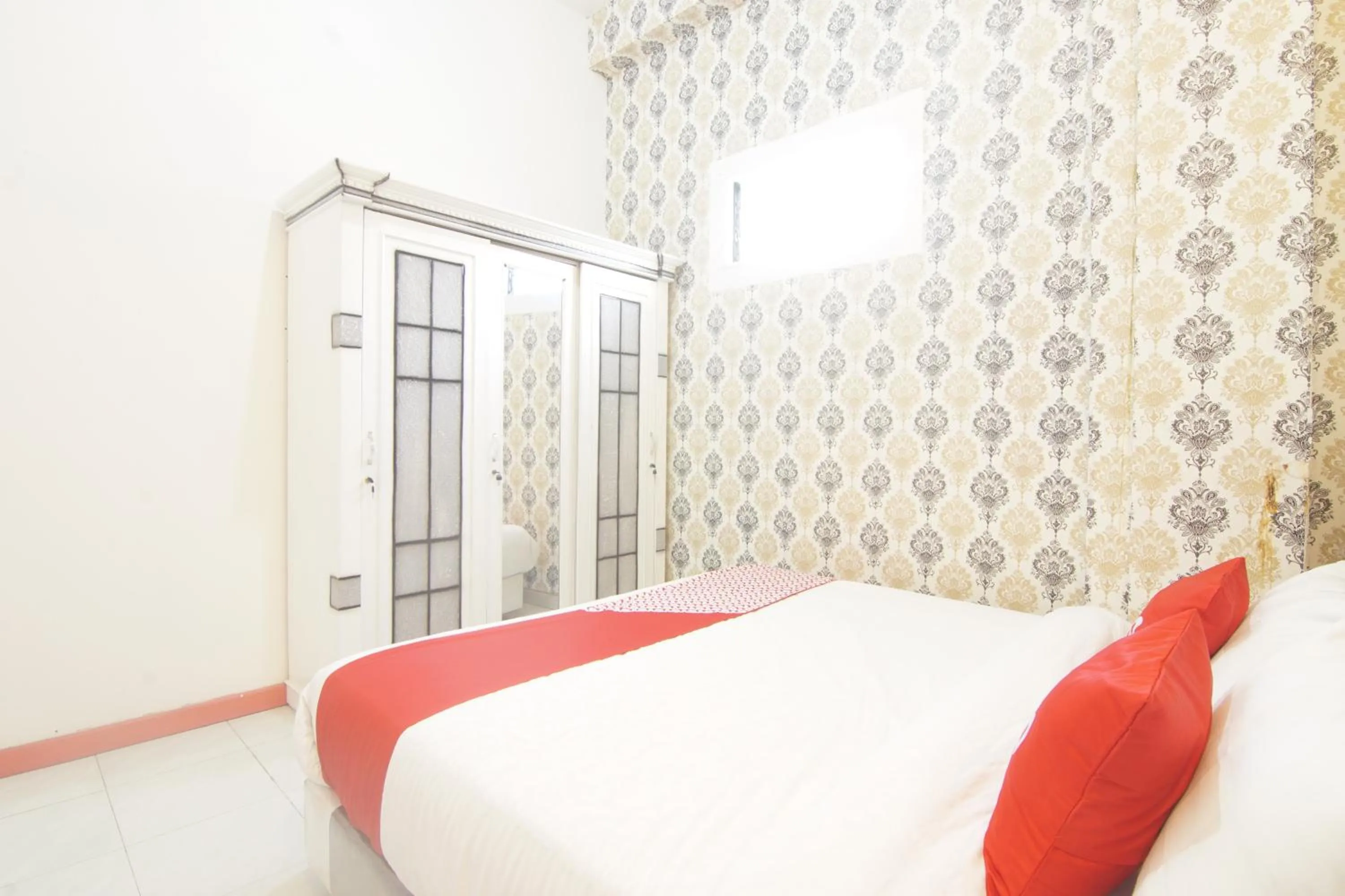 Bedroom in OYO 90615 Jojo Homestay