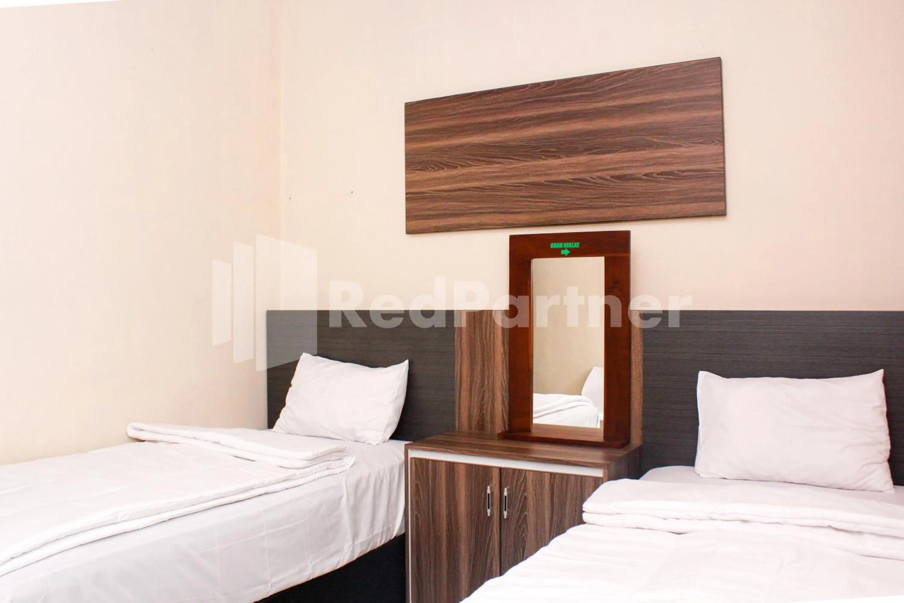 Bed in Hotel Baby Angel Dieng Mitra RedDoorz