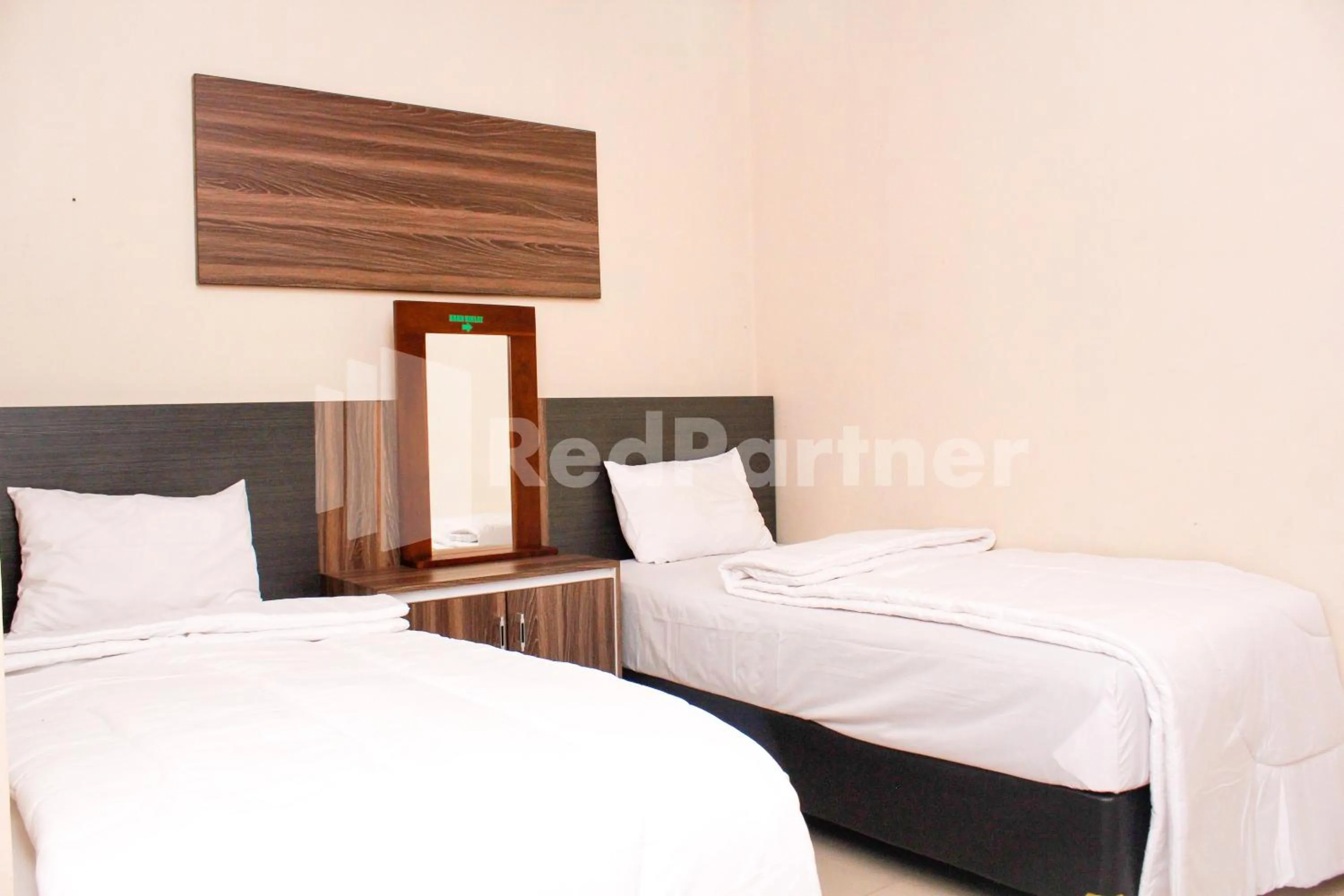 Bed in Hotel Baby Angel Dieng Mitra RedDoorz