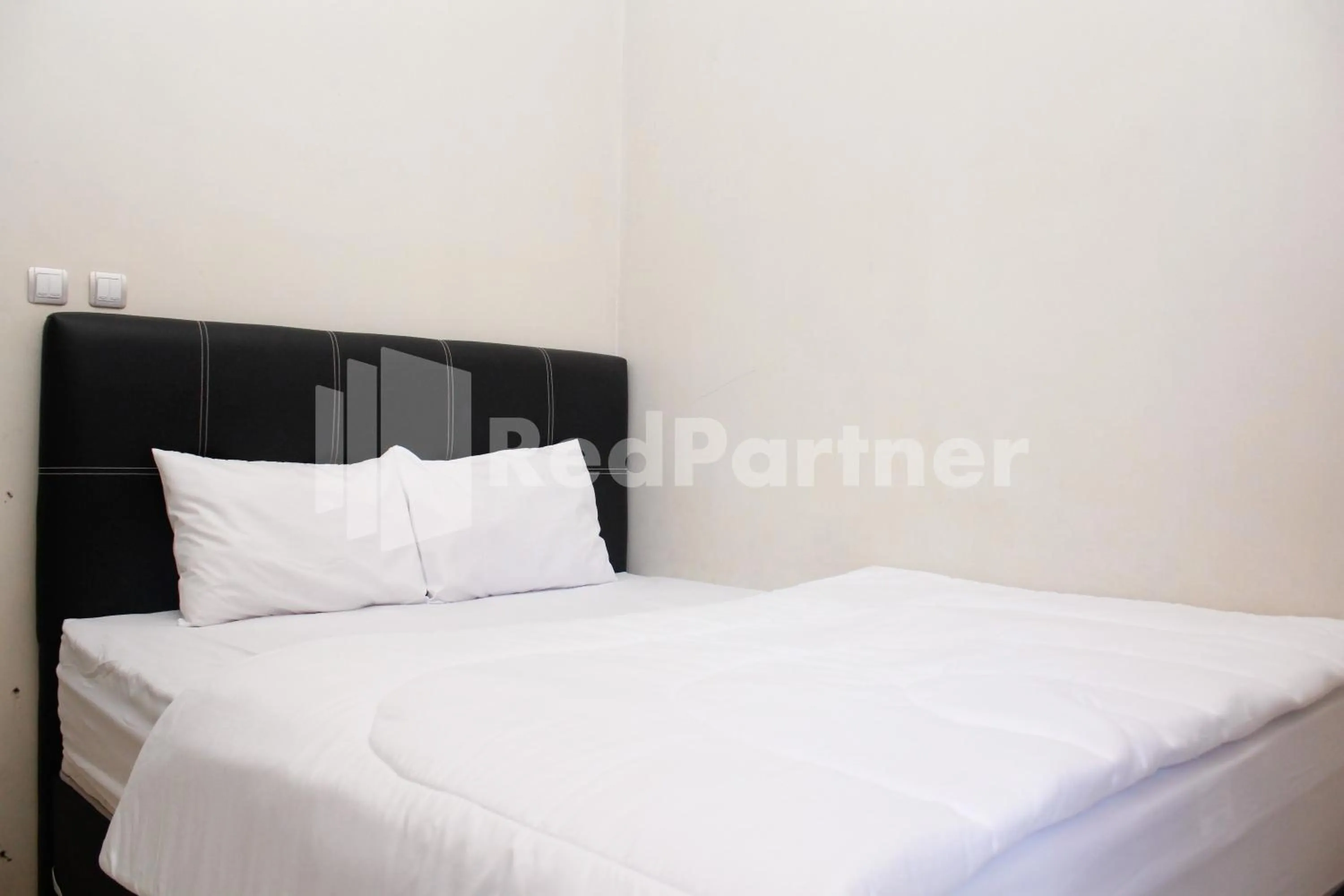 Bed in Hotel Baby Angel Dieng Mitra RedDoorz