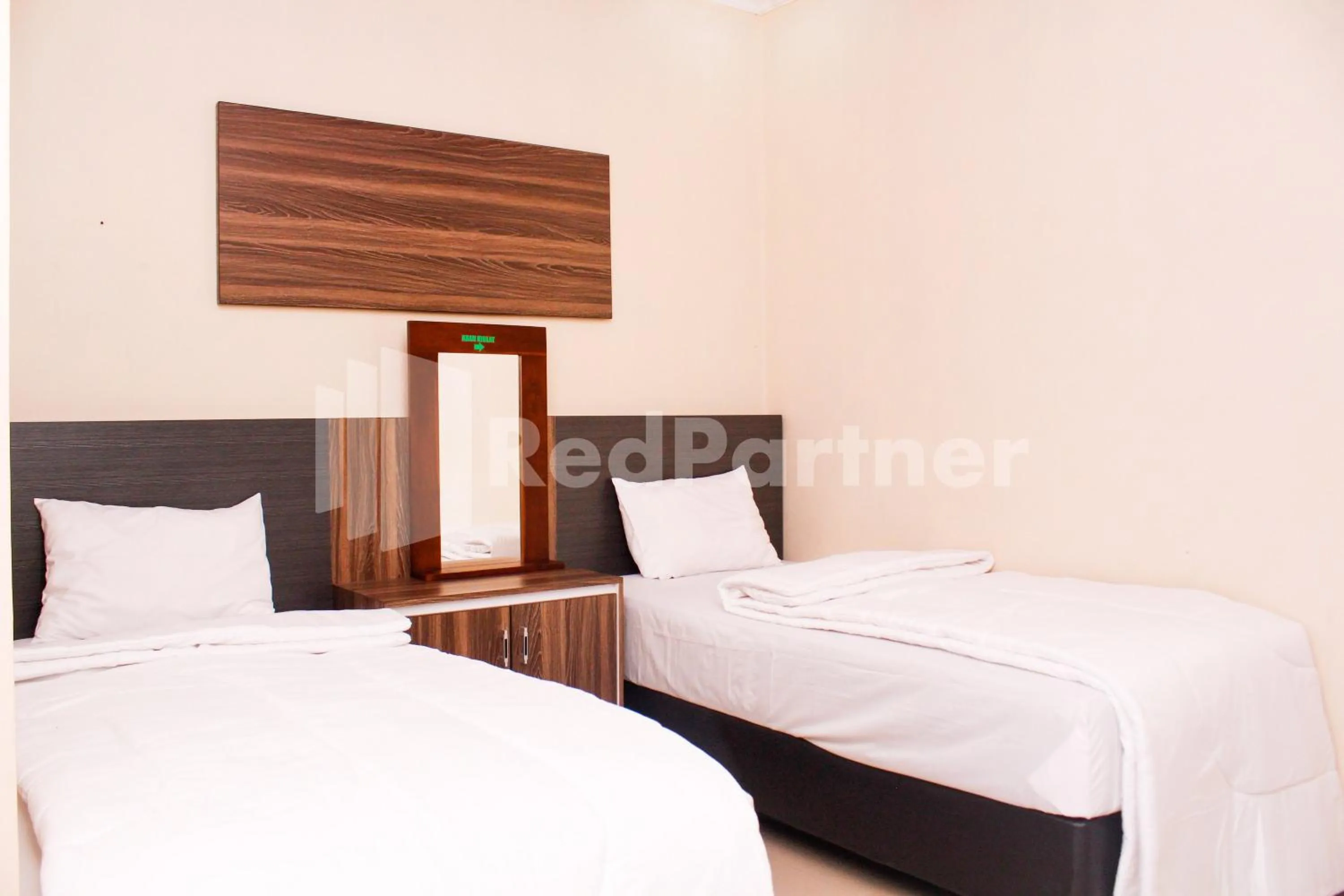 Bed in Hotel Baby Angel Dieng Mitra RedDoorz