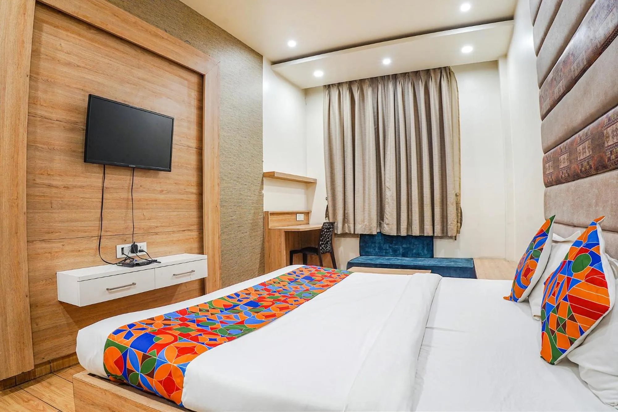 Bed in FabHotel Prime OM Palace