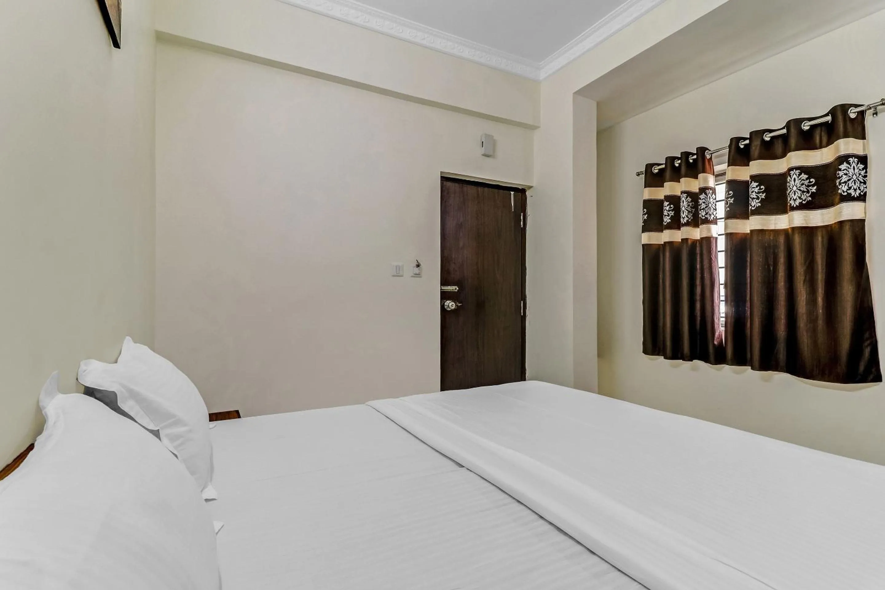 Bedroom, Bed in Capital O Safari Rooms Near Snow City