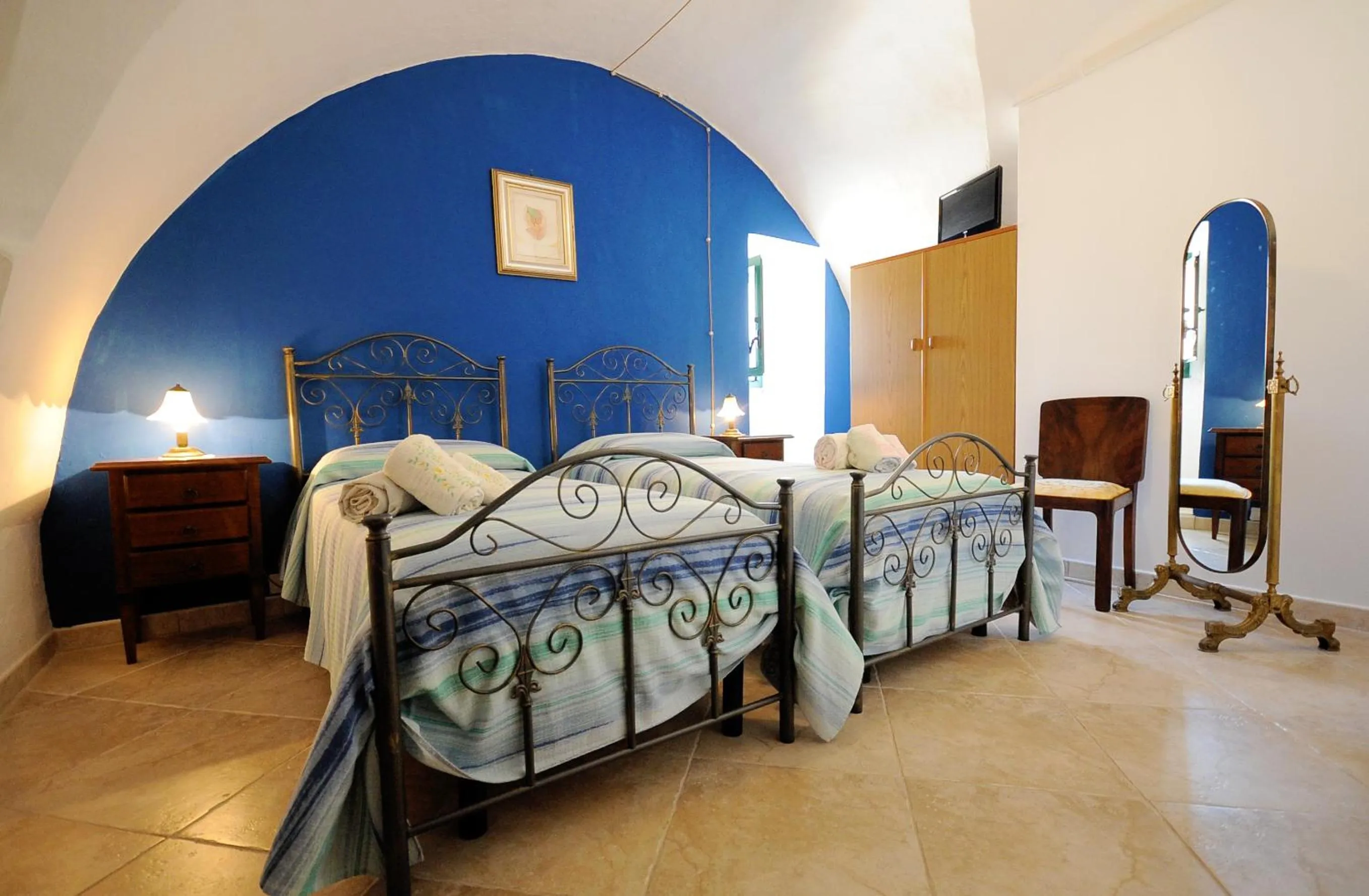 Bedroom in Palazzo Rocci Rooms