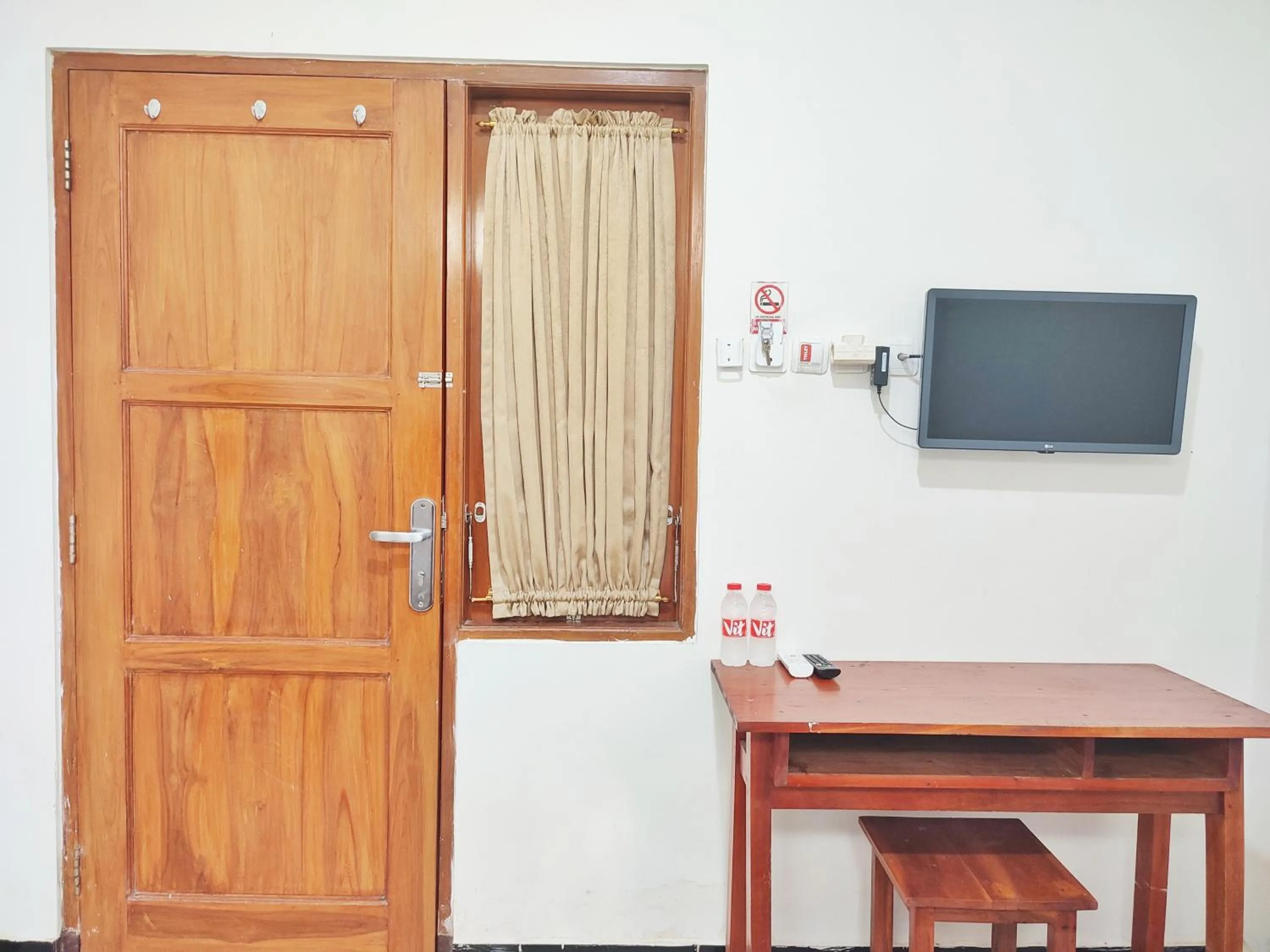 Bedroom in Happy Syariah Hotel near Jombor Mitra RedDoorz