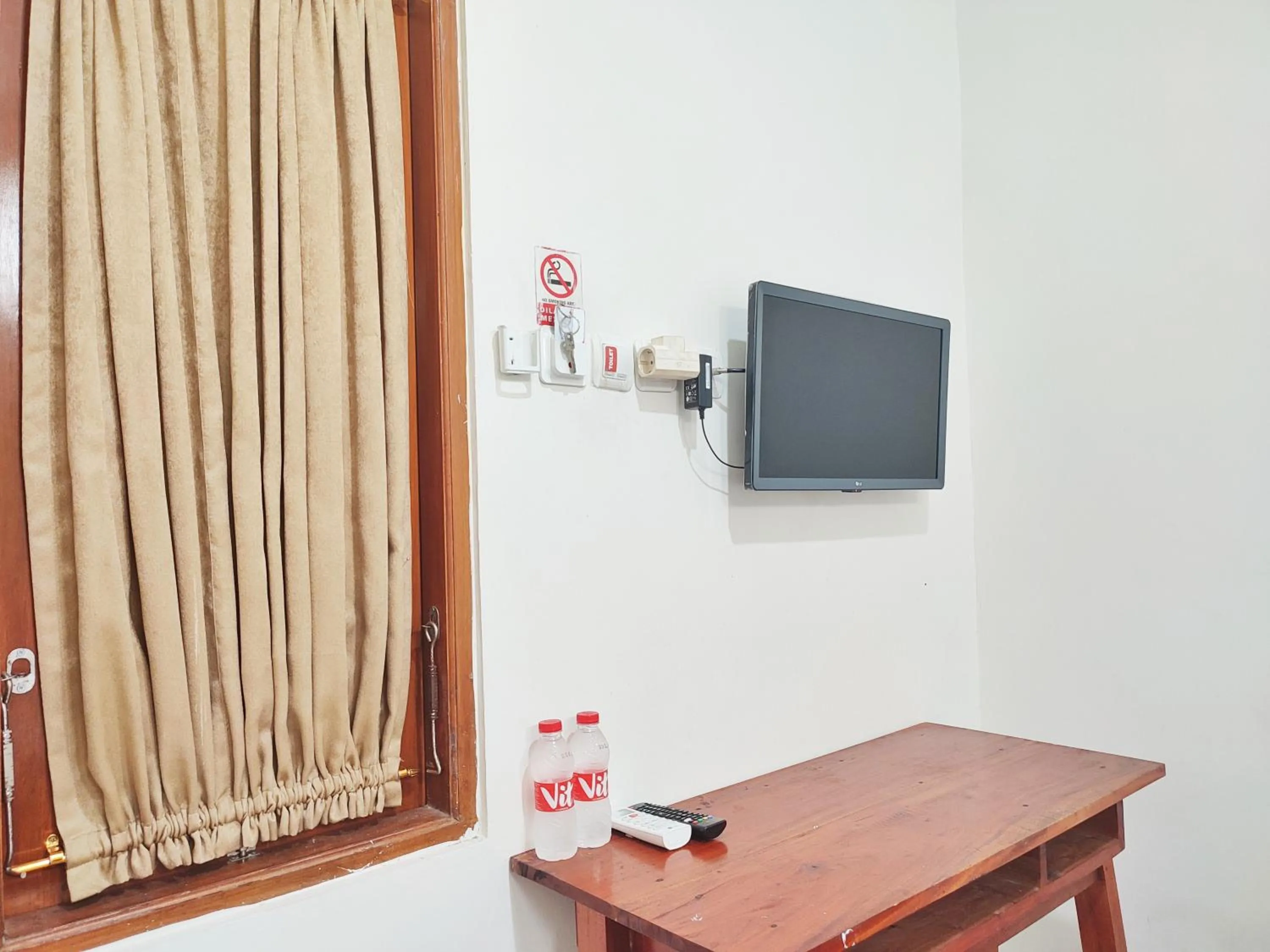 Bedroom in Happy Syariah Hotel near Jombor Mitra RedDoorz