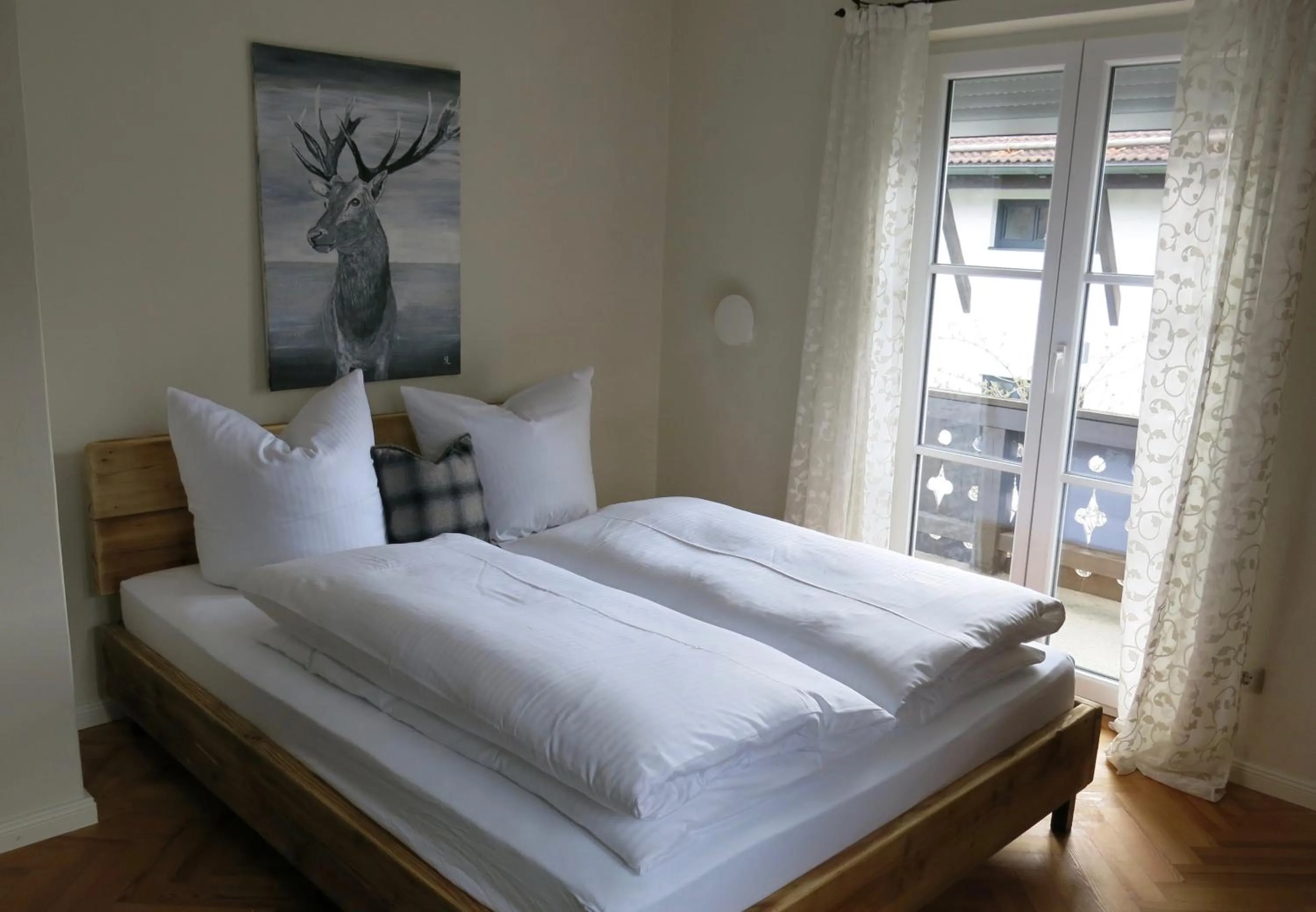 Bed in Alpenhof Garnihotel & Ferienwohnungen