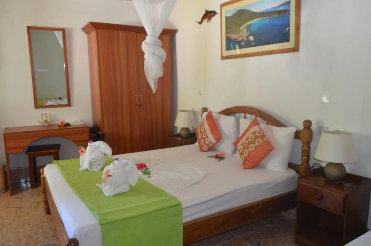 Bed in Rising Sun Guesthouse