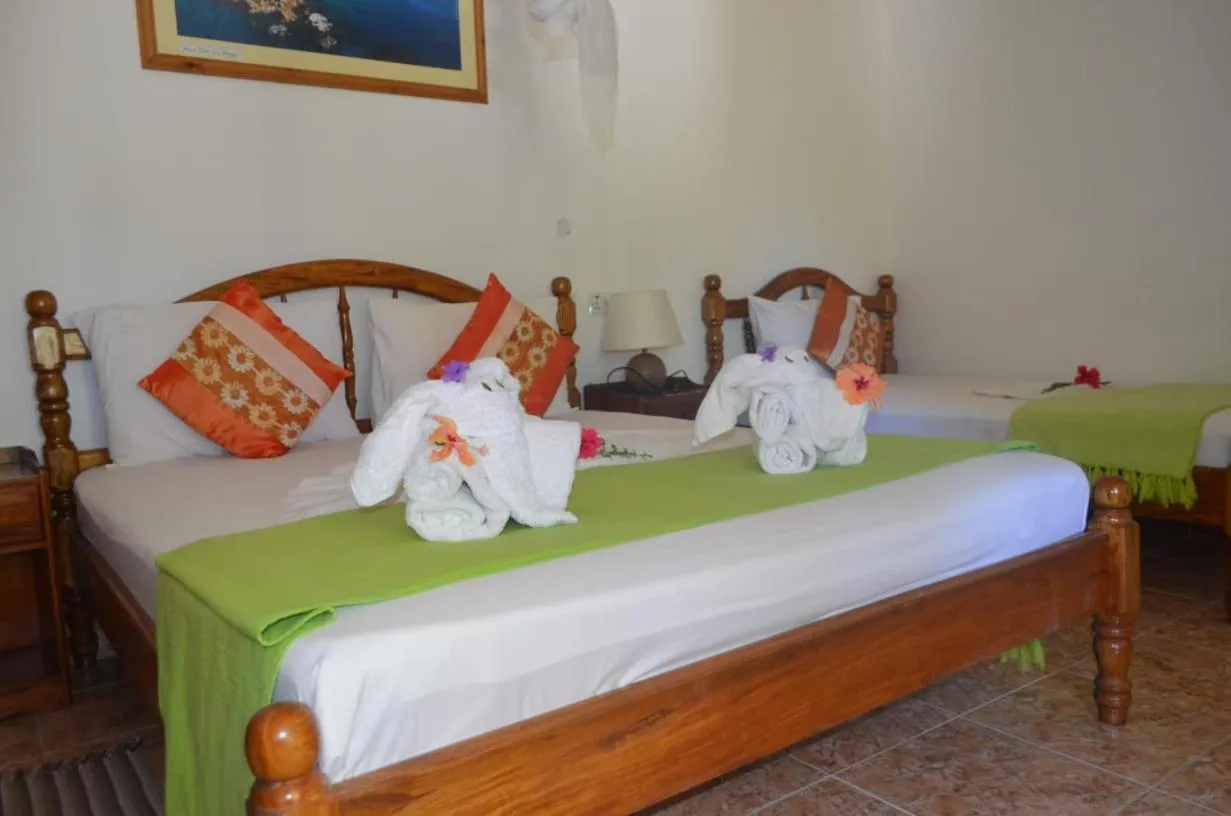 Bed in Rising Sun Guesthouse