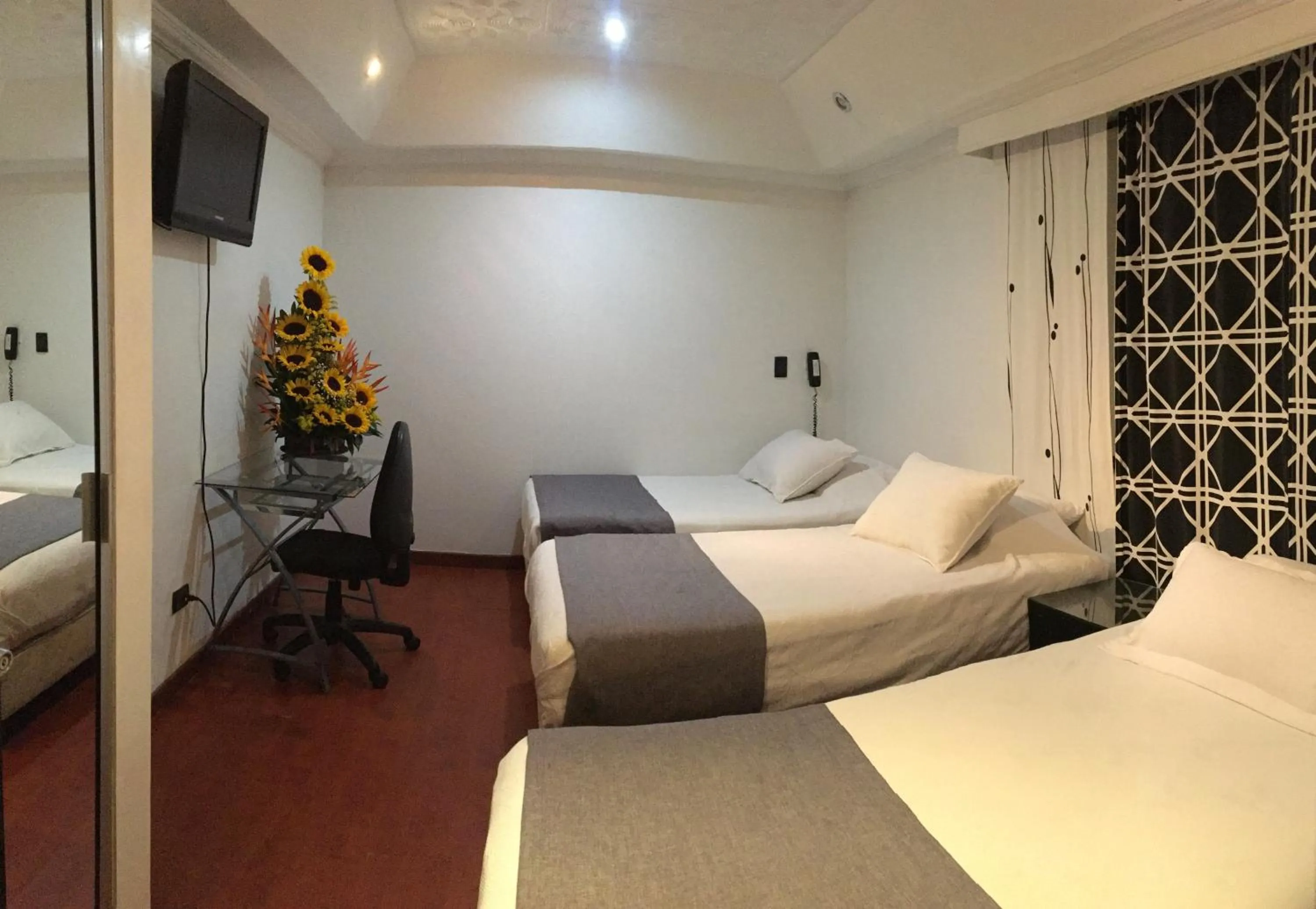 Bed in Hotel Ejecutivo Embajada