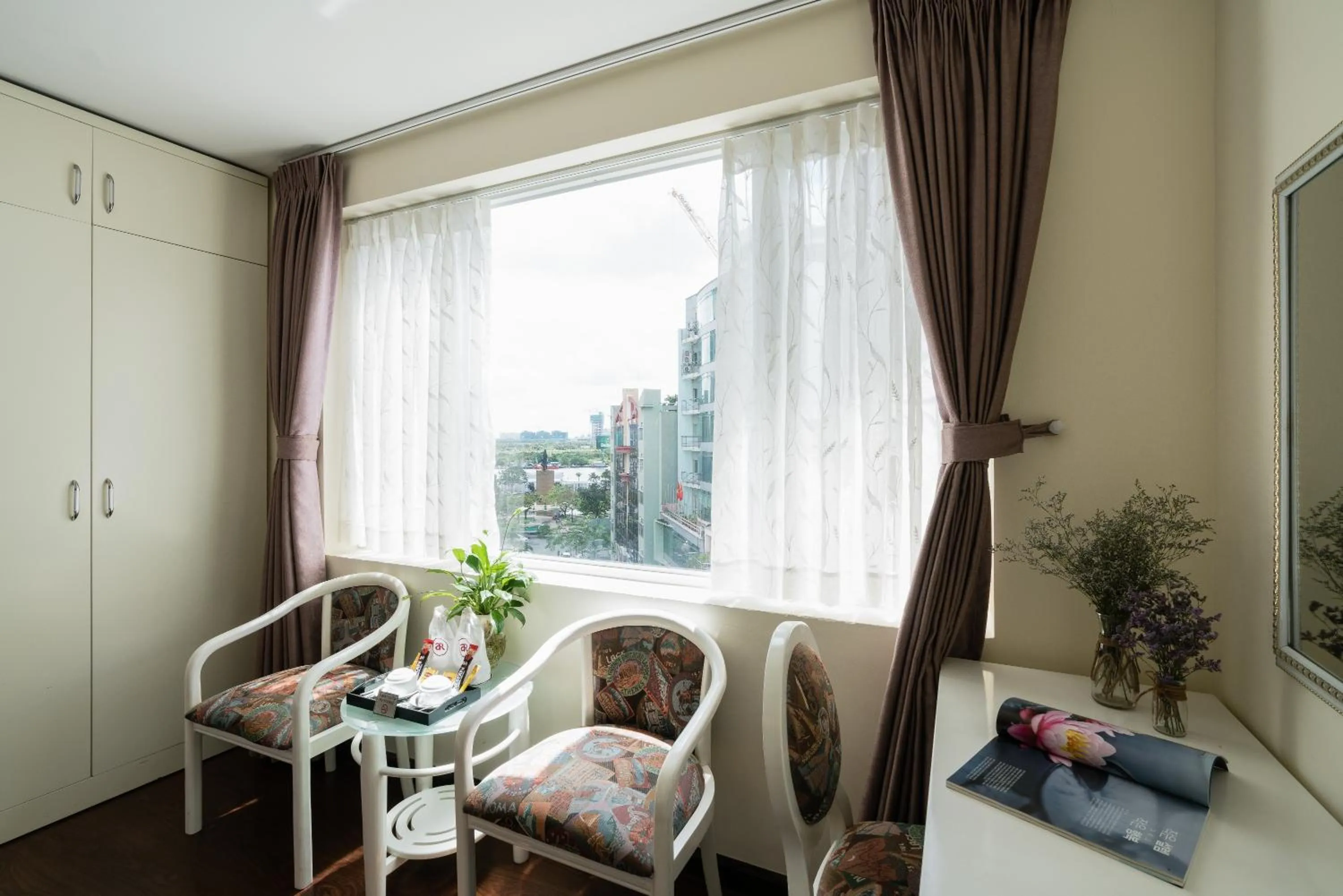 Seating area in Asian Ruby Center Point Hotel & Spa