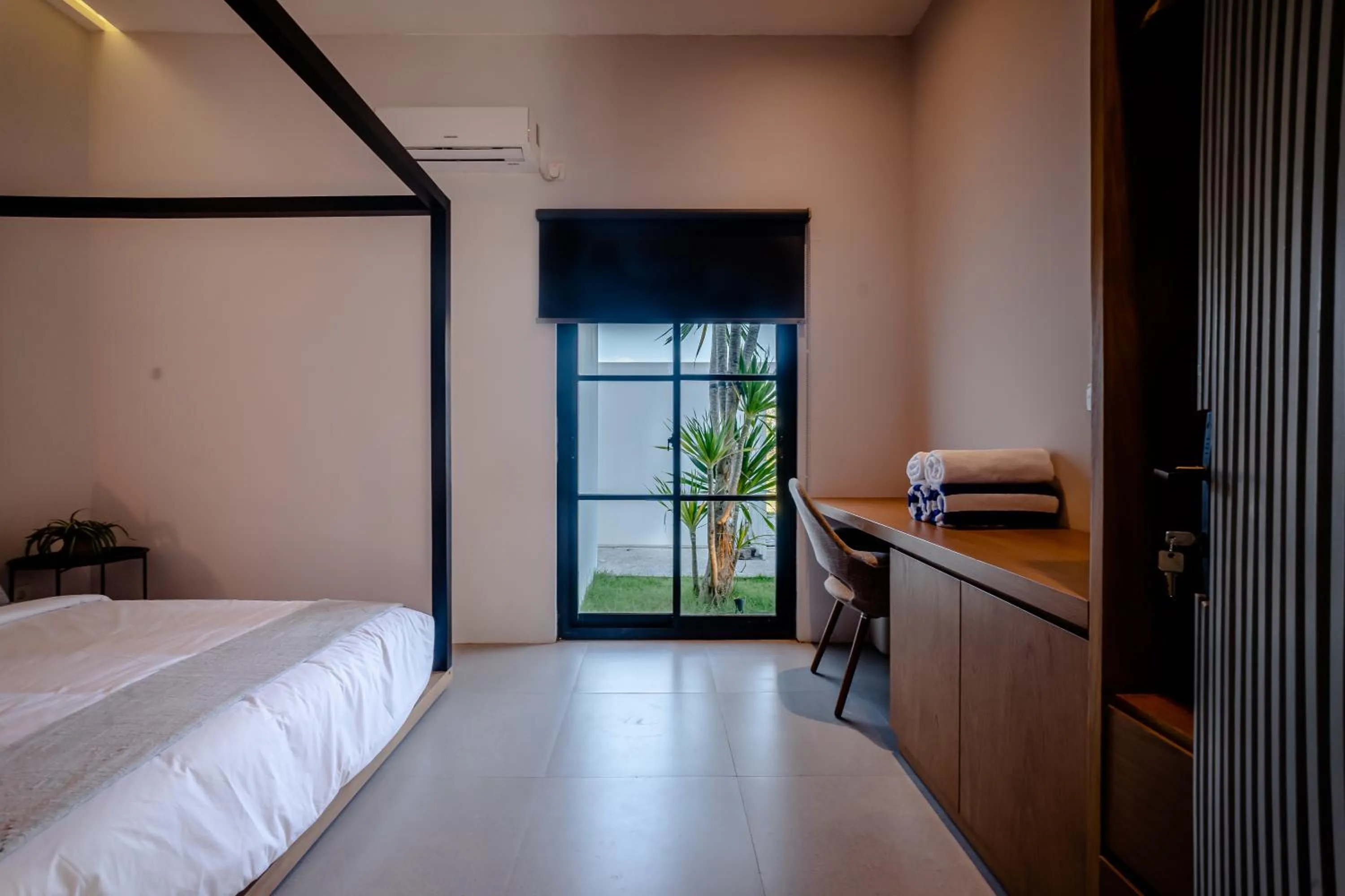 Photo of the whole room, Bed in Mile Stone Villa