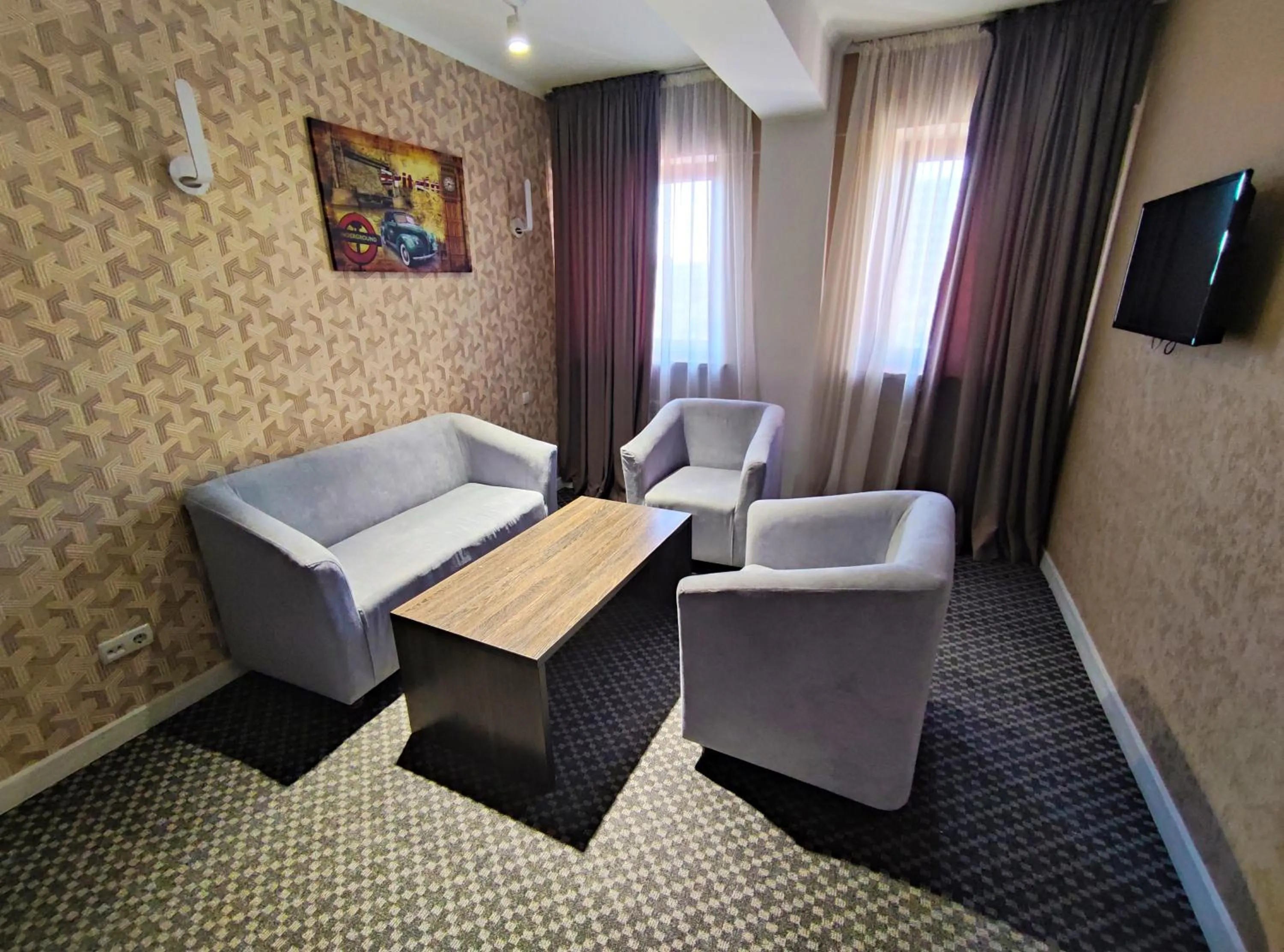 Living room in Golden Palace Hotel