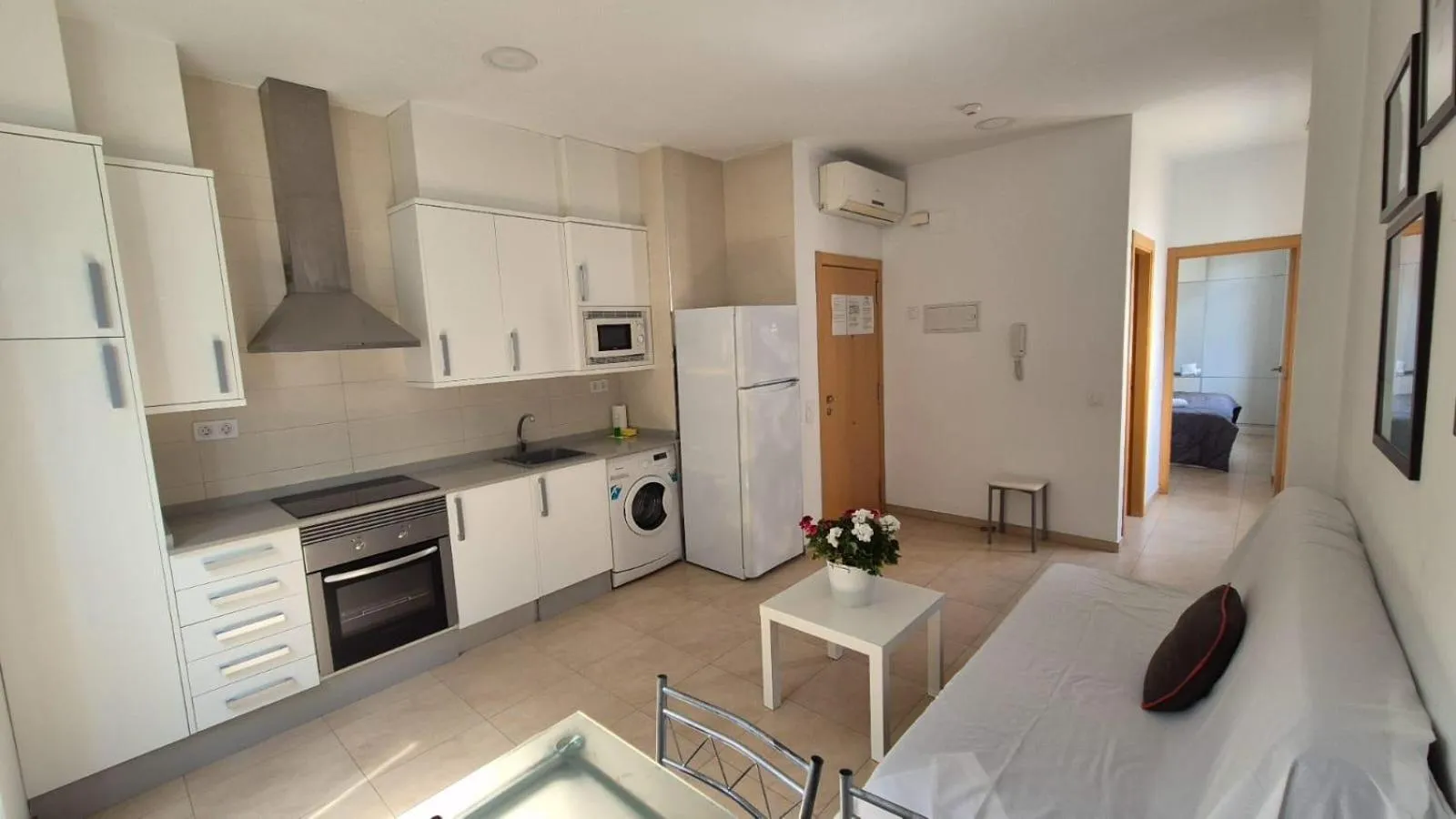 Living room, Bed in Luxury Apartments Puerto Valencia