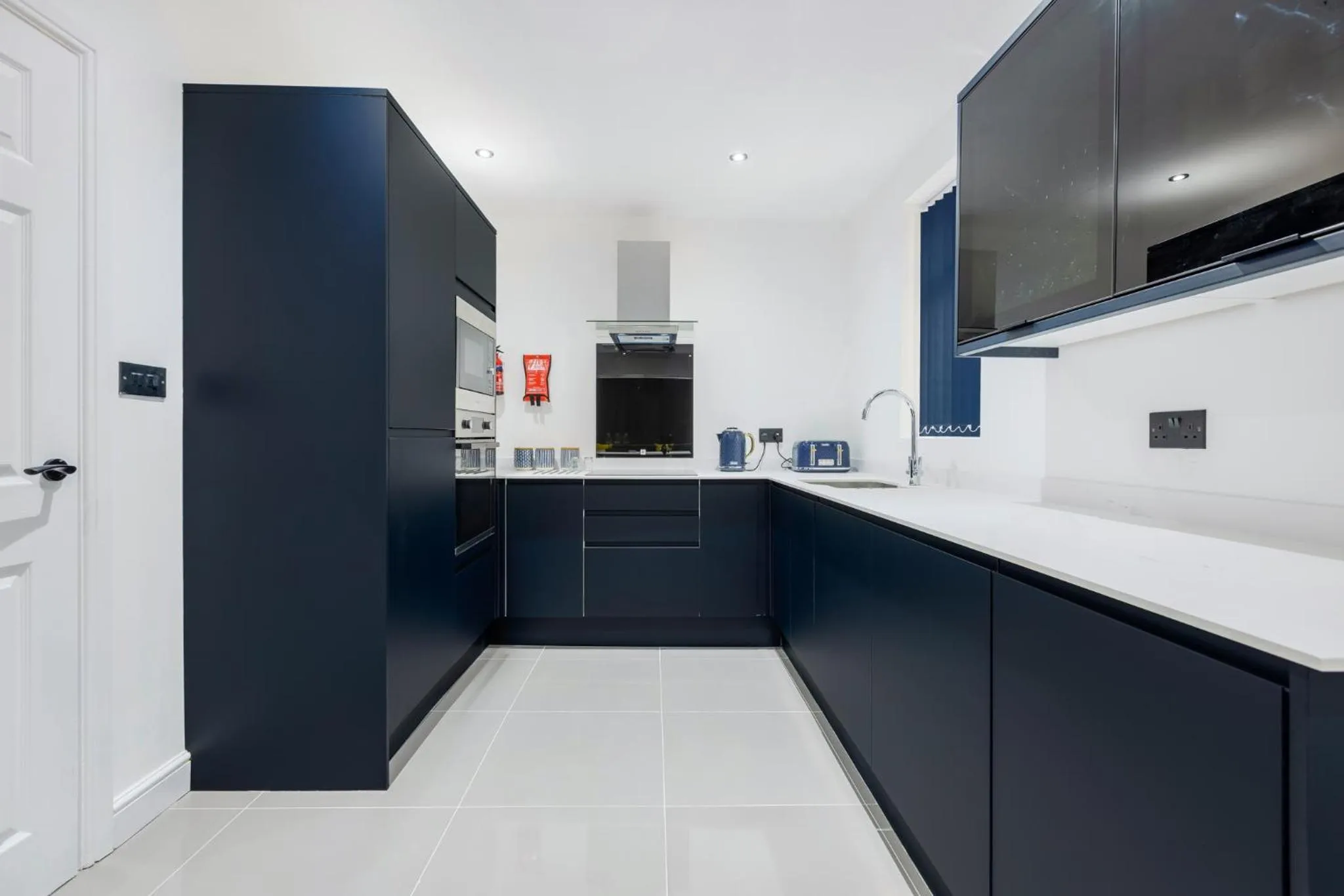 Kitchen or kitchenette in Wellington Suites by Sasco Apartments