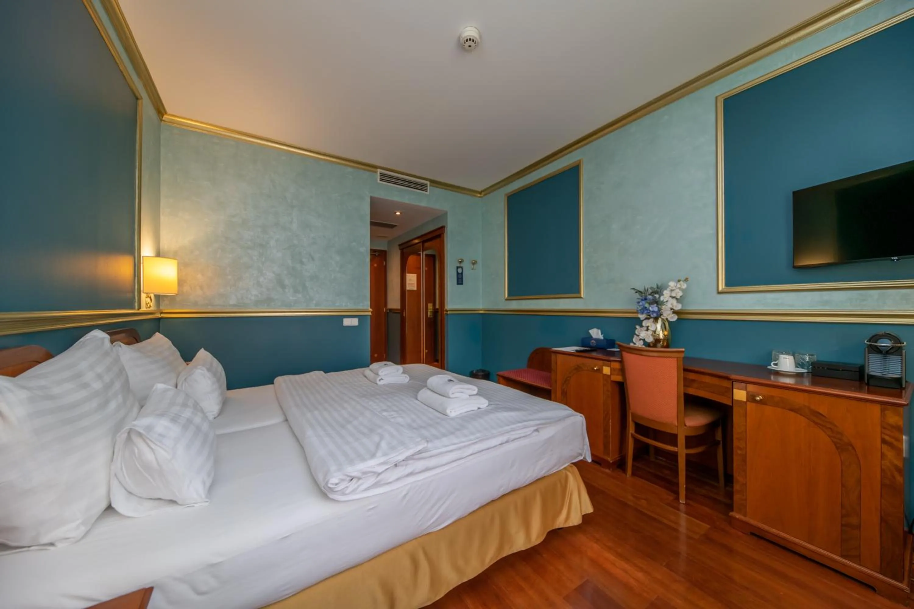 Bed in Hotel Kinsky Fountain