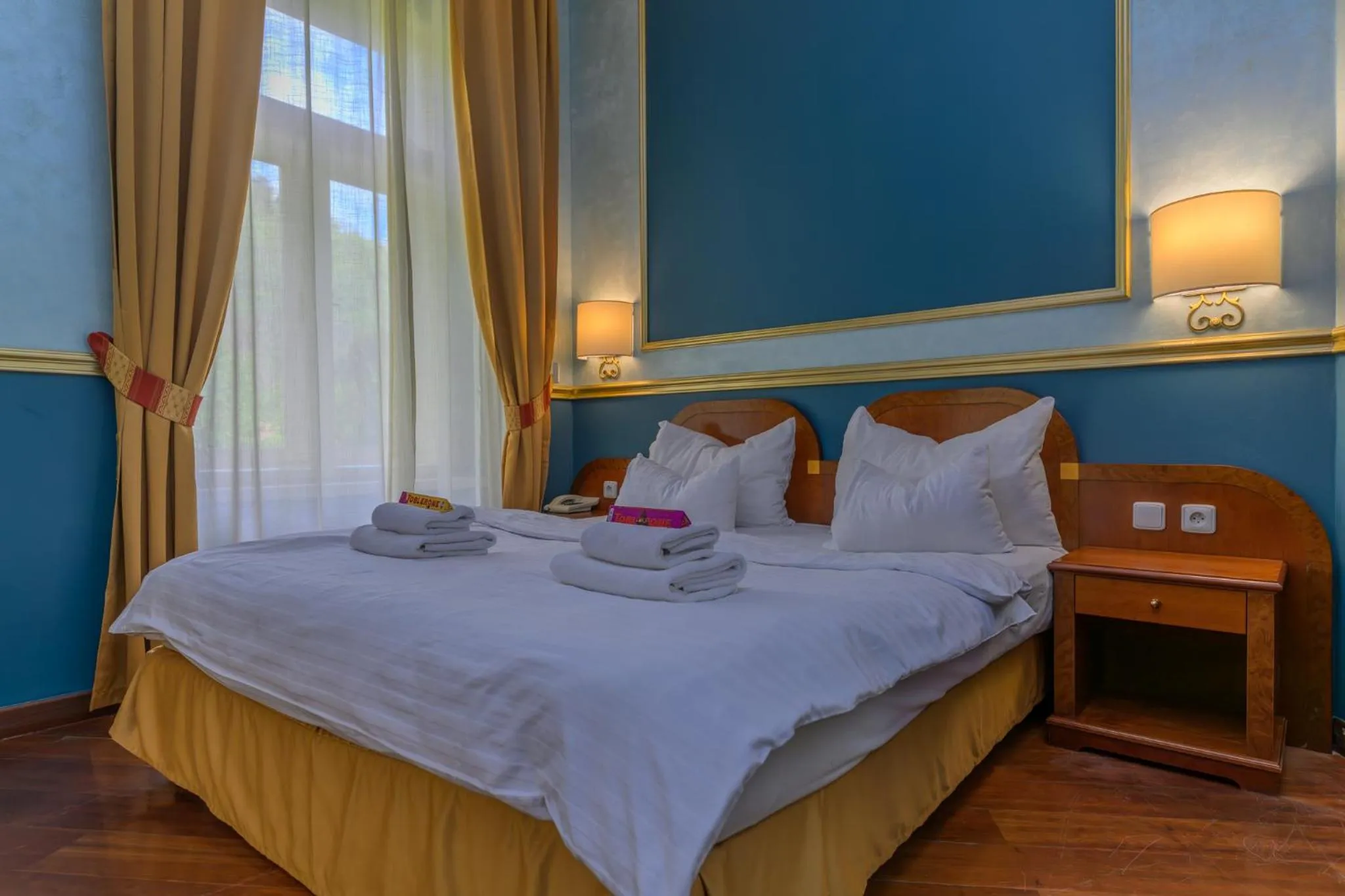 Bed in Hotel Kinsky Fountain