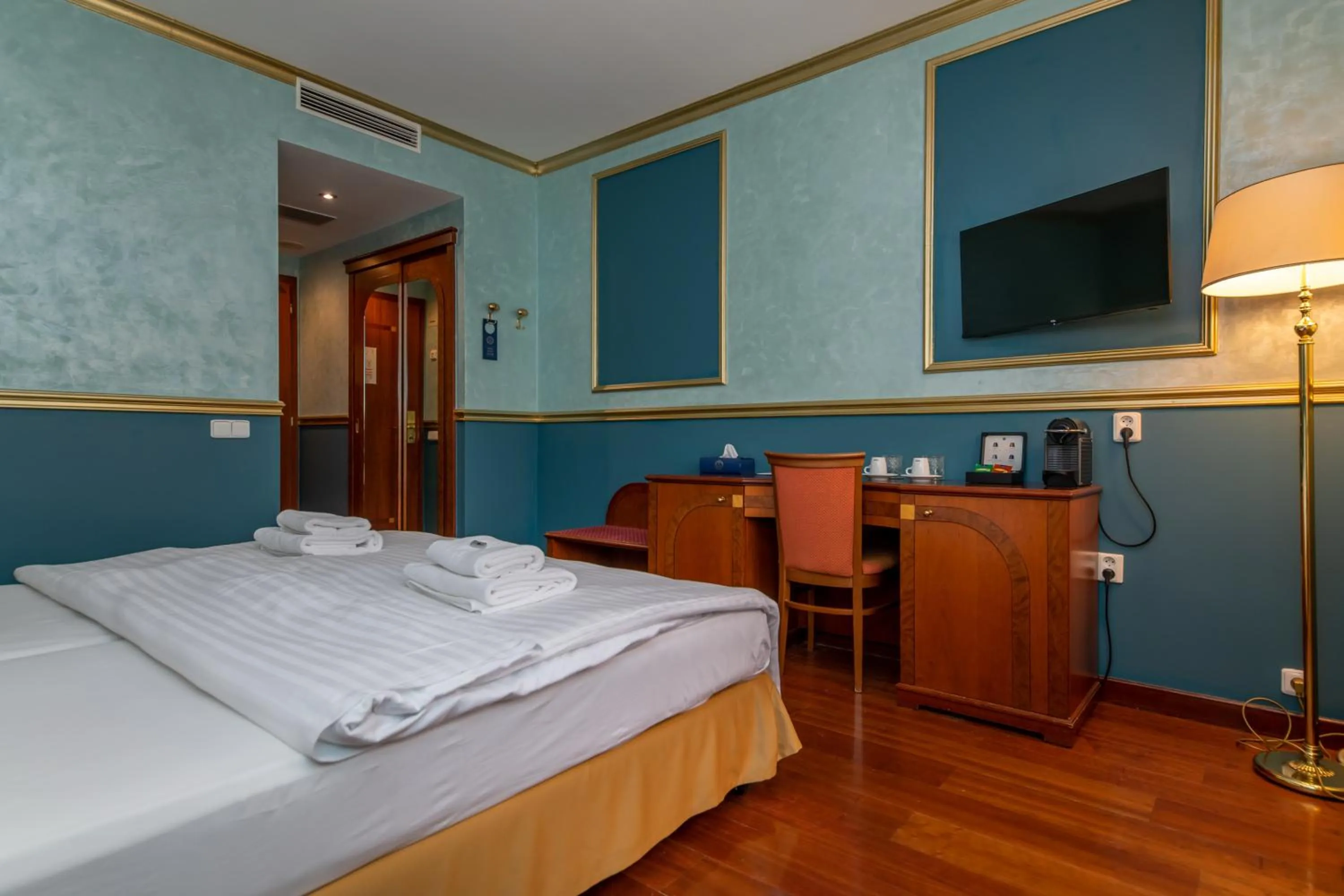 Bed in Hotel Kinsky Fountain