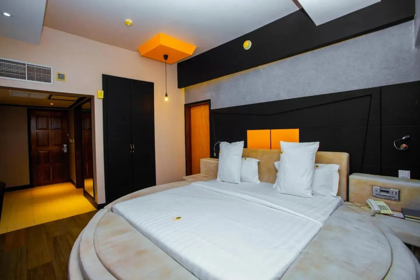 Bed in Gold Crest Hotel