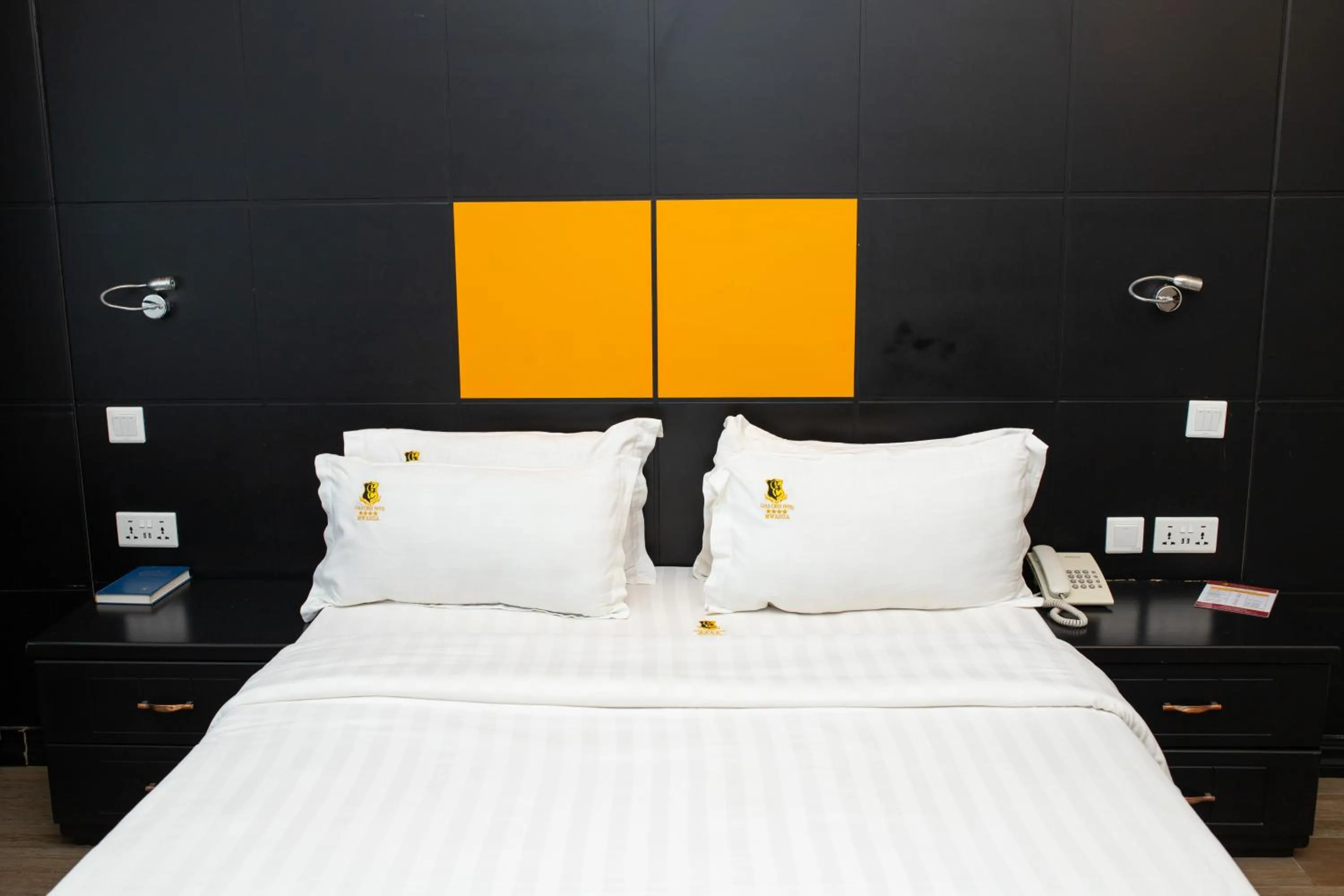 Bed in Gold Crest Hotel