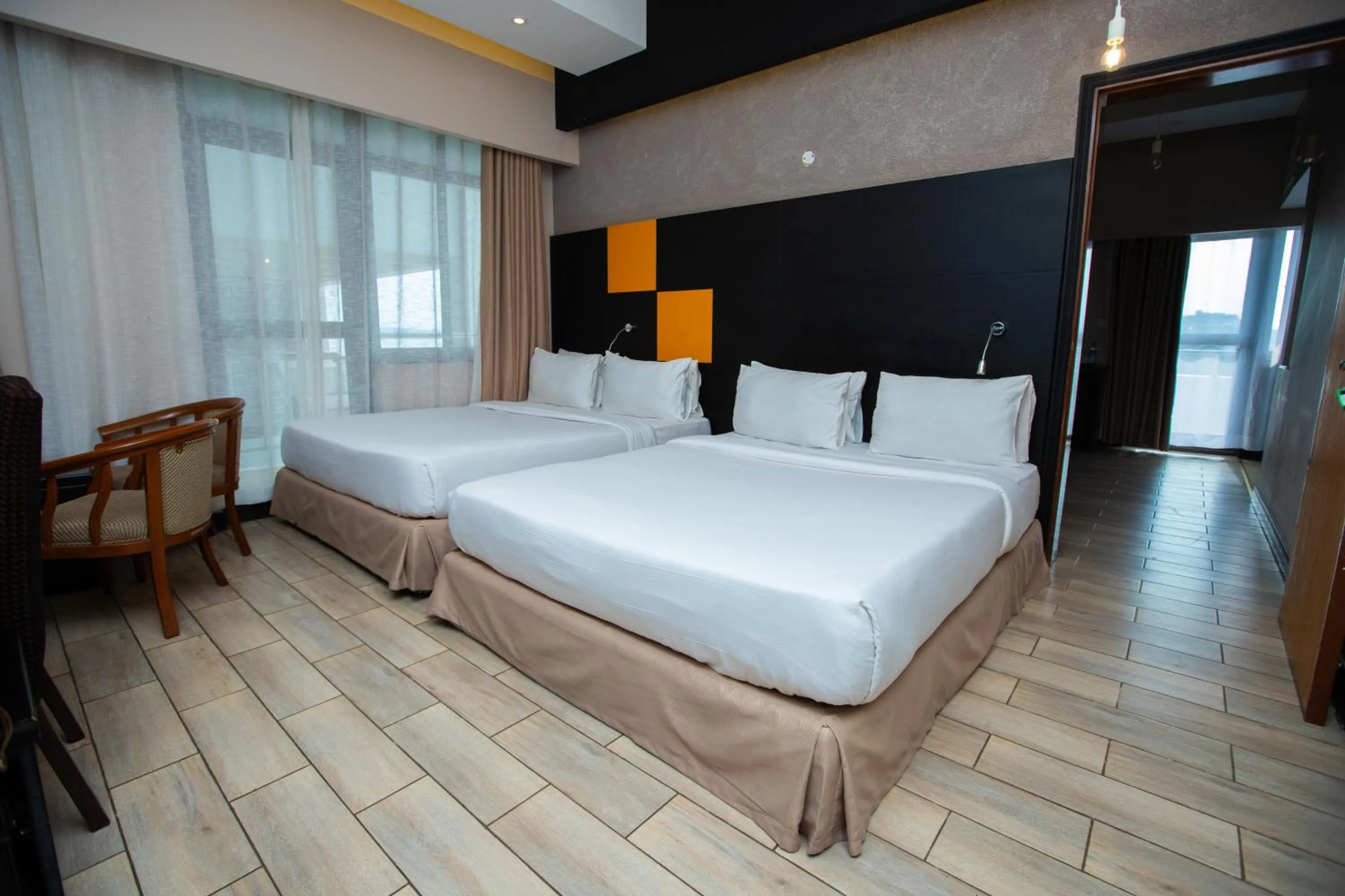 Bed in Gold Crest Hotel